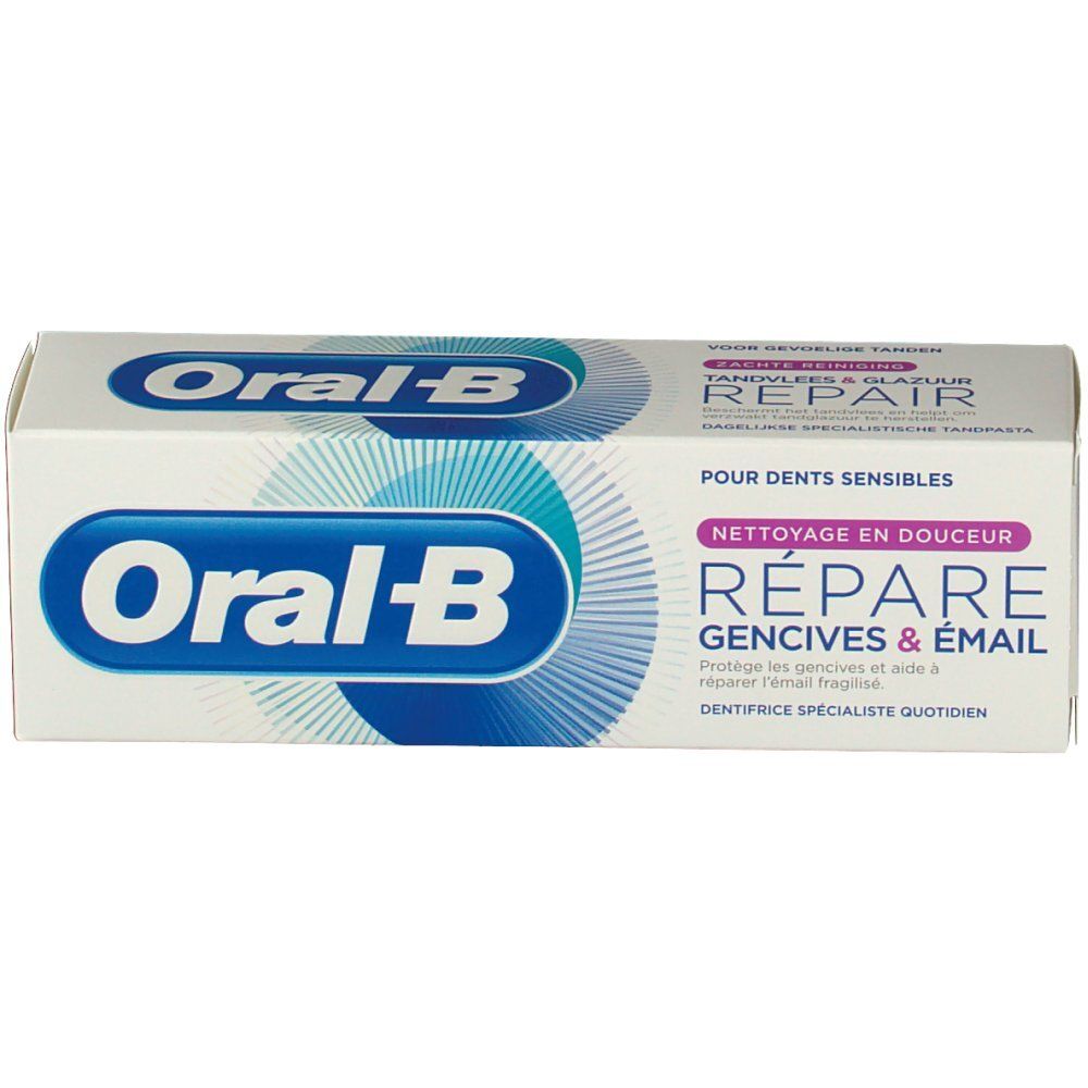 Zahnpasta-Verpackung. Weiß, mit blauem Logo und Text. "Réparer gencives & émail" und "Oral-B" sichtbar.