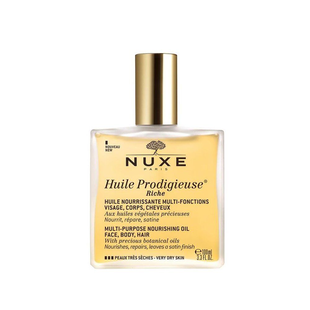 Flacon NUXE Huile Prodigieuse Riche, vu de trois quarts avant. Huile jaune avec bouchon doré.