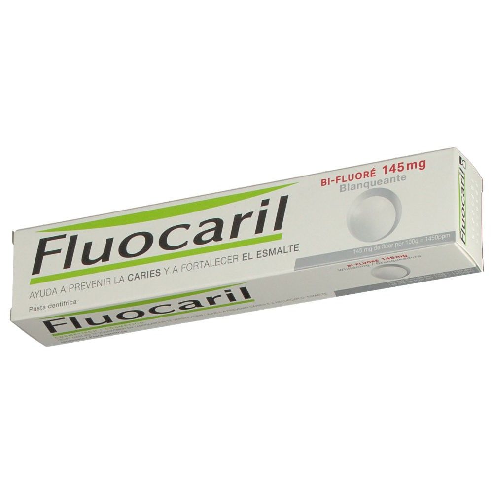 Zahncreme-Schachtel, weiß mit grüner Schrift. Aufschrift Fluocaril. Enthält 145mg Fluorid. Perspektivische Ansicht.