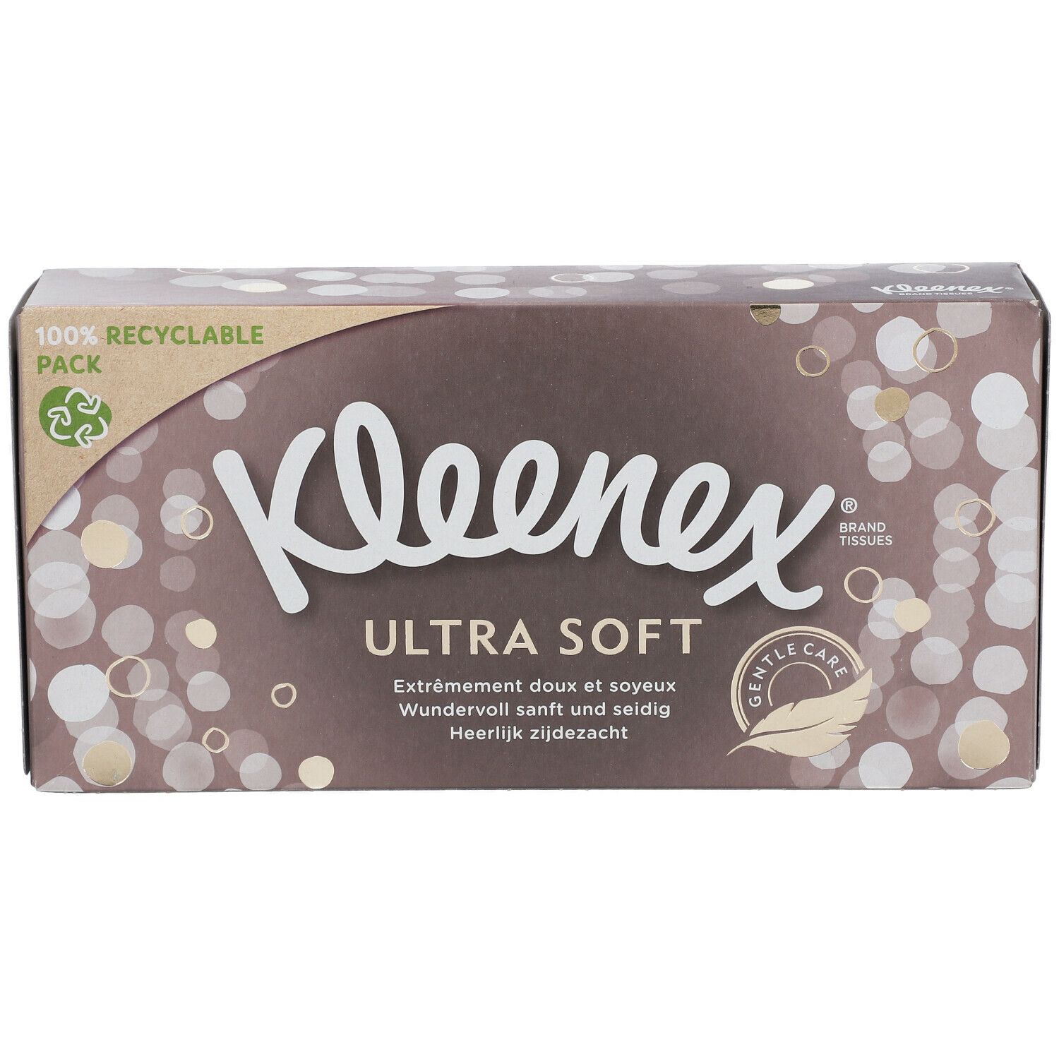 Kleenex Ultra Soft Box. Braune Verpackung mit weißen und goldenen Kreisen. Text: Ultra Soft, 100% recycelbar.