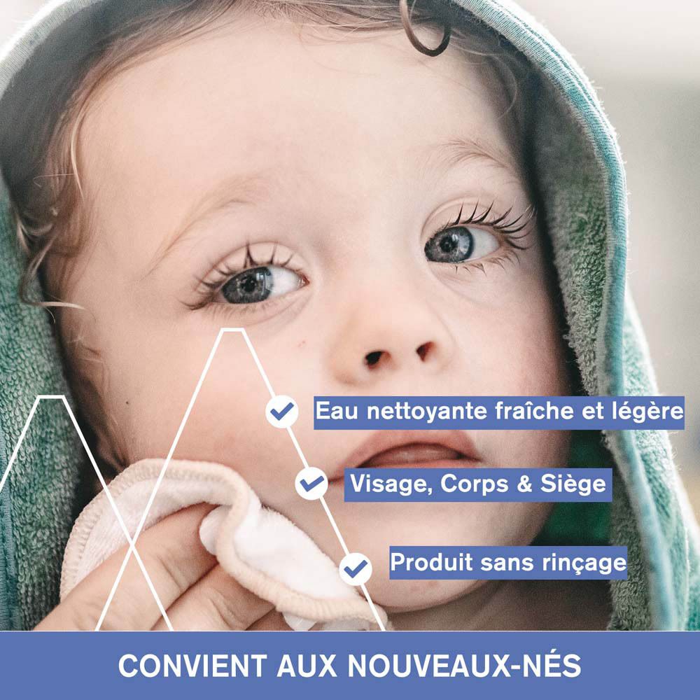 Gros plan d'un bébé. Texte : Apaise, adoucit et protège la peau.