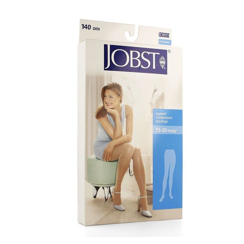 Emballage de bas JOBST. Inscription : 140 DEN, logo JOBST, bas de compression 15-20 mmHg. Femme assise.