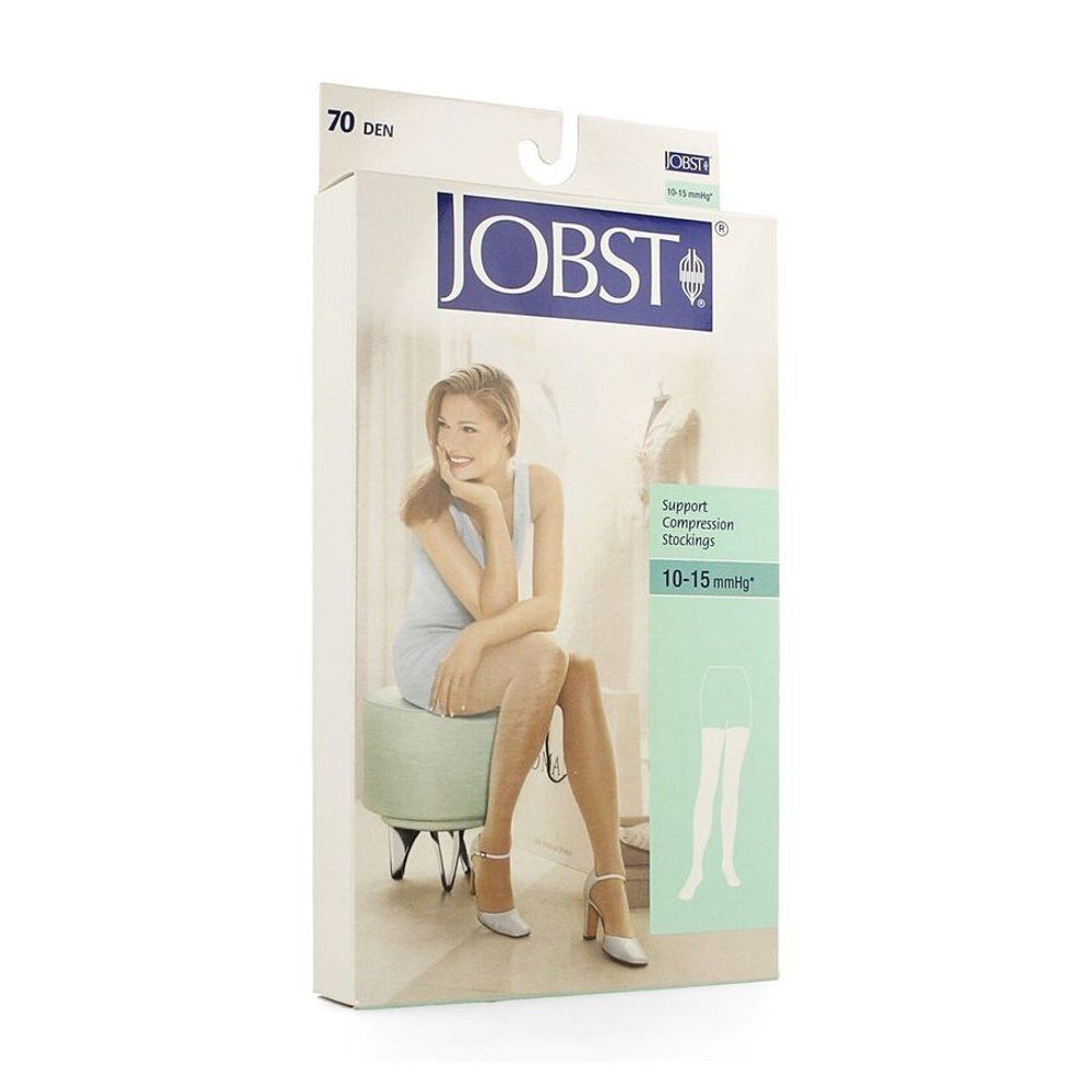 Emballage de bas JOBST. Inscriptions : 70 DEN, logo JOBST, 10-15 mmHg. Illustration d'une femme portant des bas.