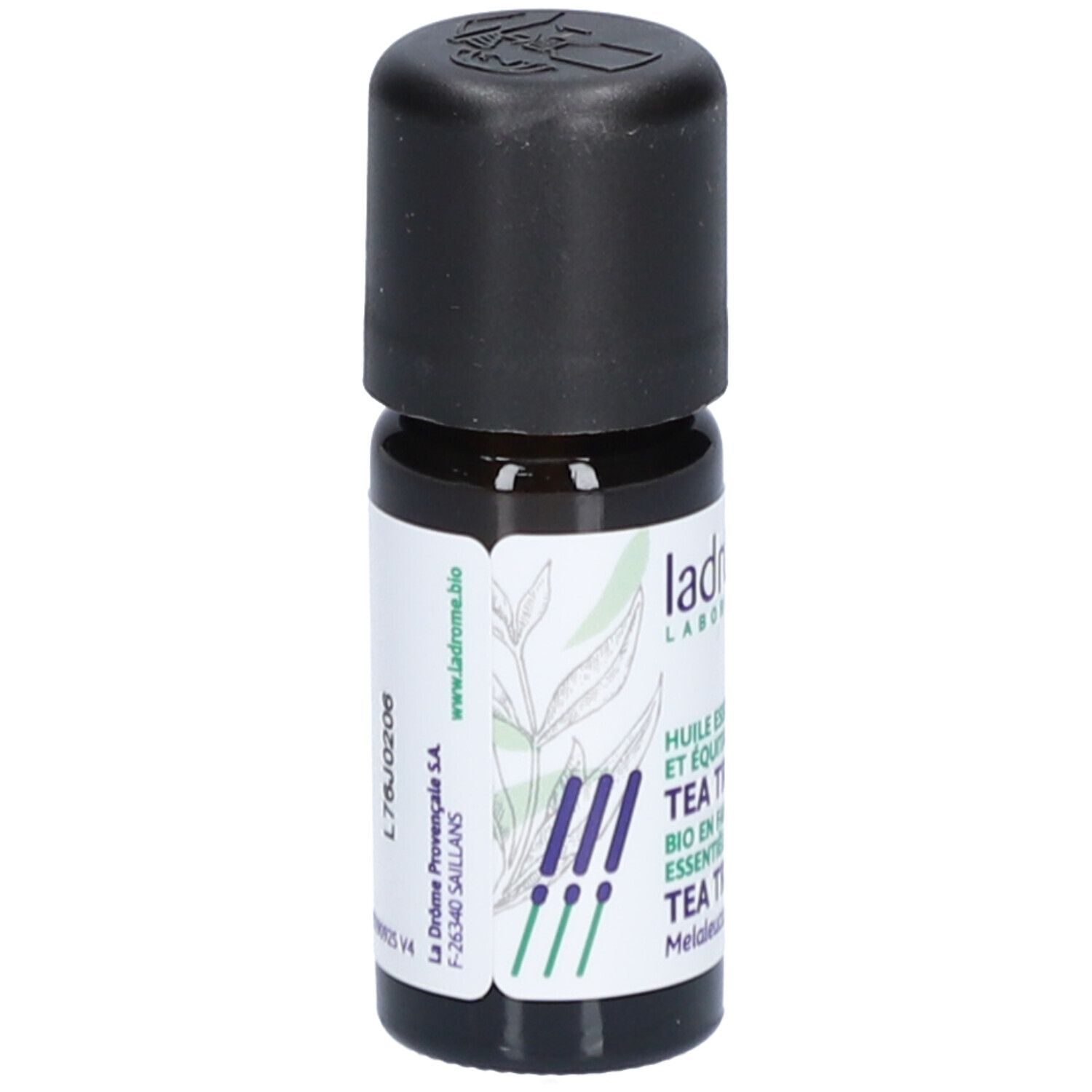 Flacon en verre brun avec bouchon noir. Étiquette avec informations sur le produit et logo. Inscription : Tea Tree.