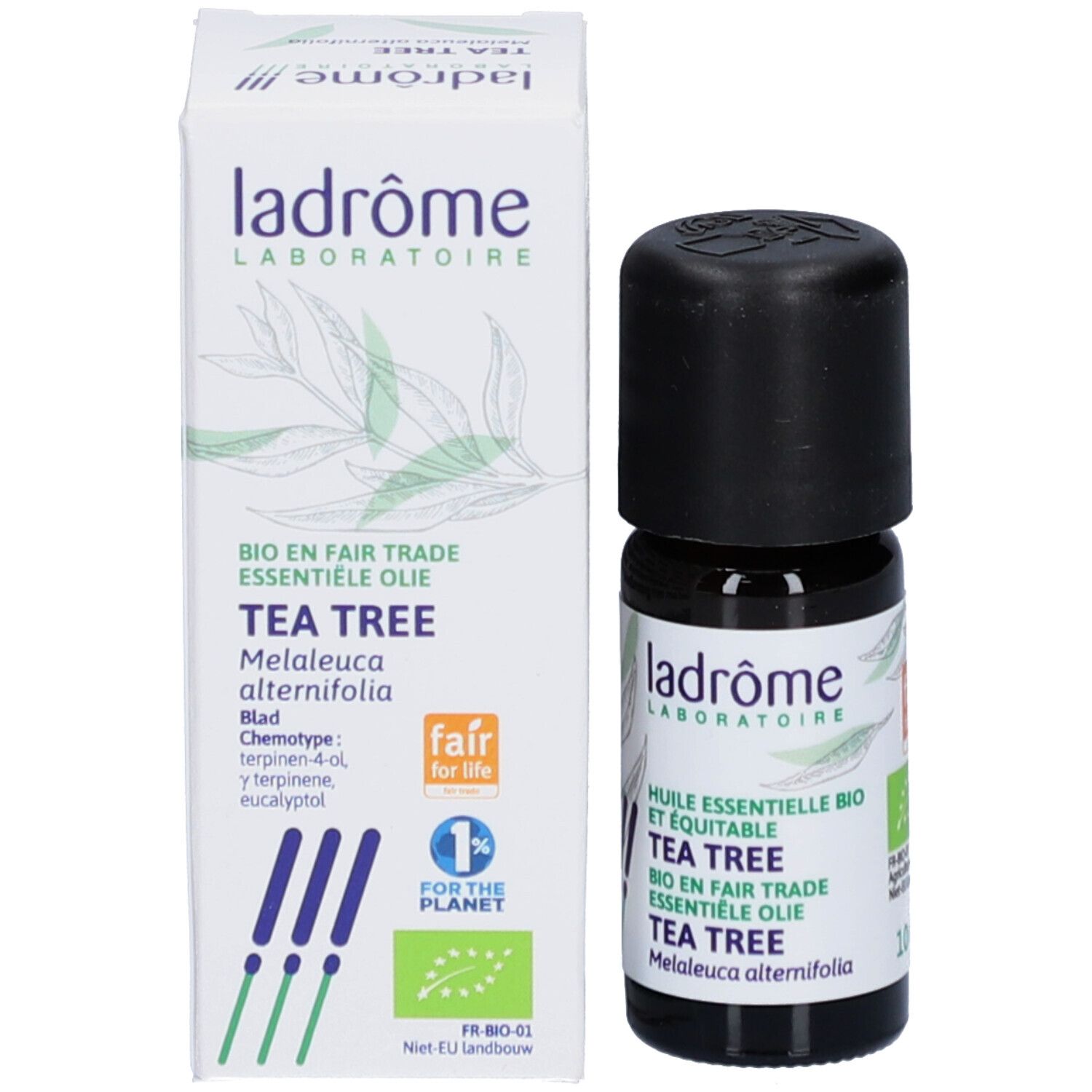 Flacon et boîte. Inscription : Tea Tree. Boîte blanche avec logo et nom du produit. Flacon brun.