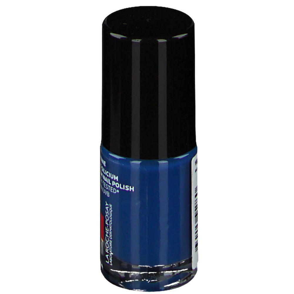 Flacon de vernis à ongles bleu foncé avec bouchon noir. Marque La Roche-Posay. Texte: Toleriane, Vernis Silicium.