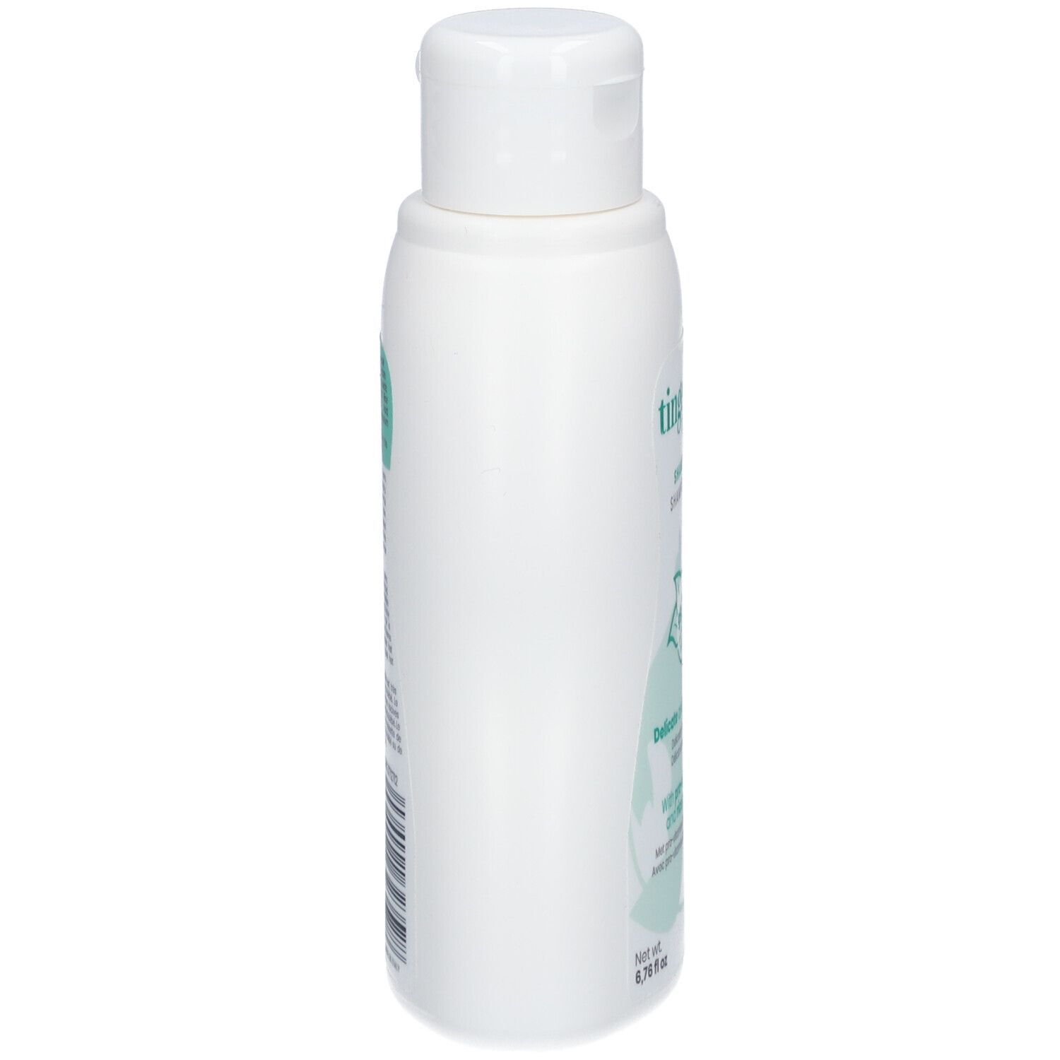 Baby wird mit Shampoo gewaschen. Shampoo-Flasche mit Pumpverschluss. Aufschrift: tinge shampoo.