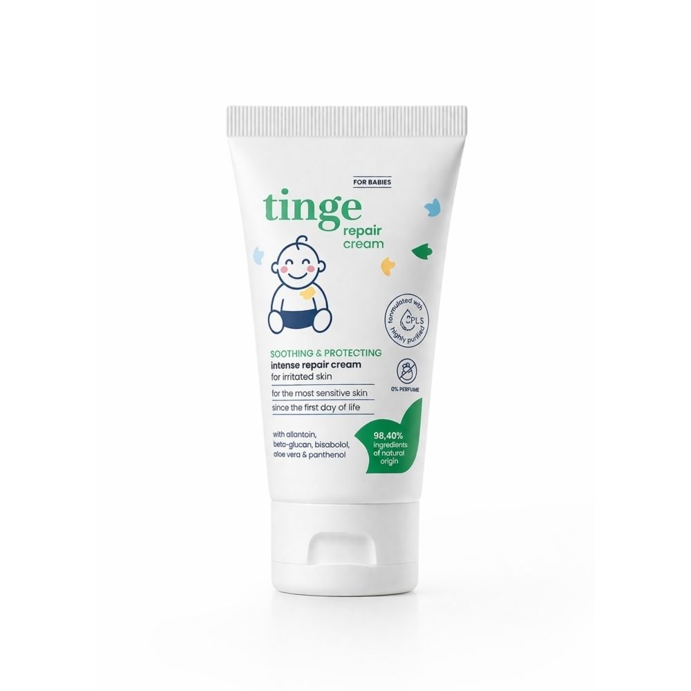 Tube blanc avec texte: Repair Cream, pour peaux sensibles. Dès la naissance. 50 ml. Avec huile d'amande.