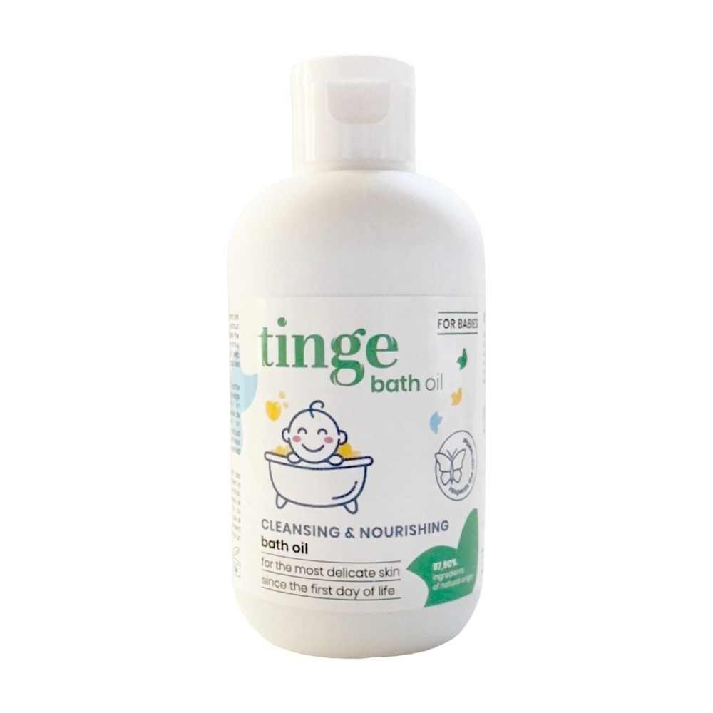 Flacon blanc avec étiquette verte. Inscription : tinge for babies, bath oil, badeöl, huile de bain, badeöl.