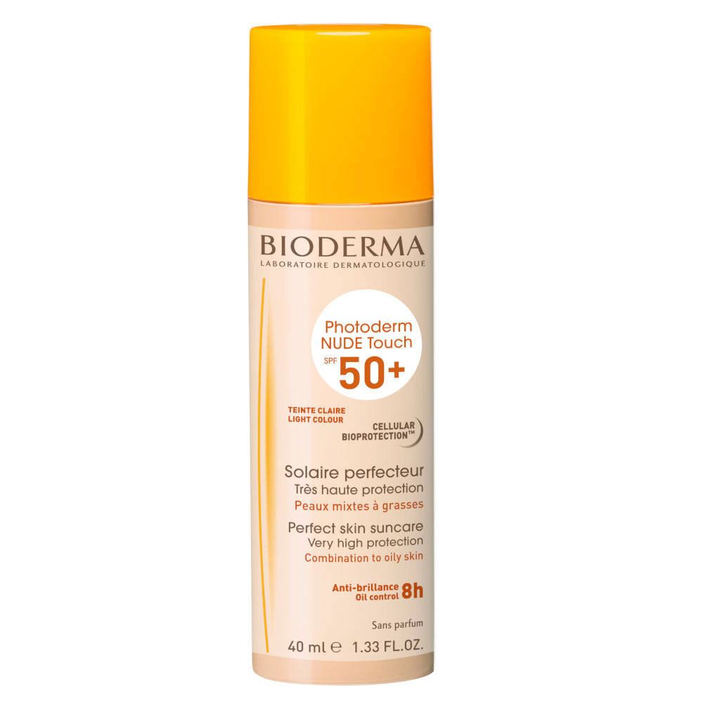 BIODERMA Photoderm NUDE Touch SPF 50+ Flasche. Gelb-orangefarbener Deckel, beige Flasche. Text: SPF 50+, Teinte Claire, 40 ml.