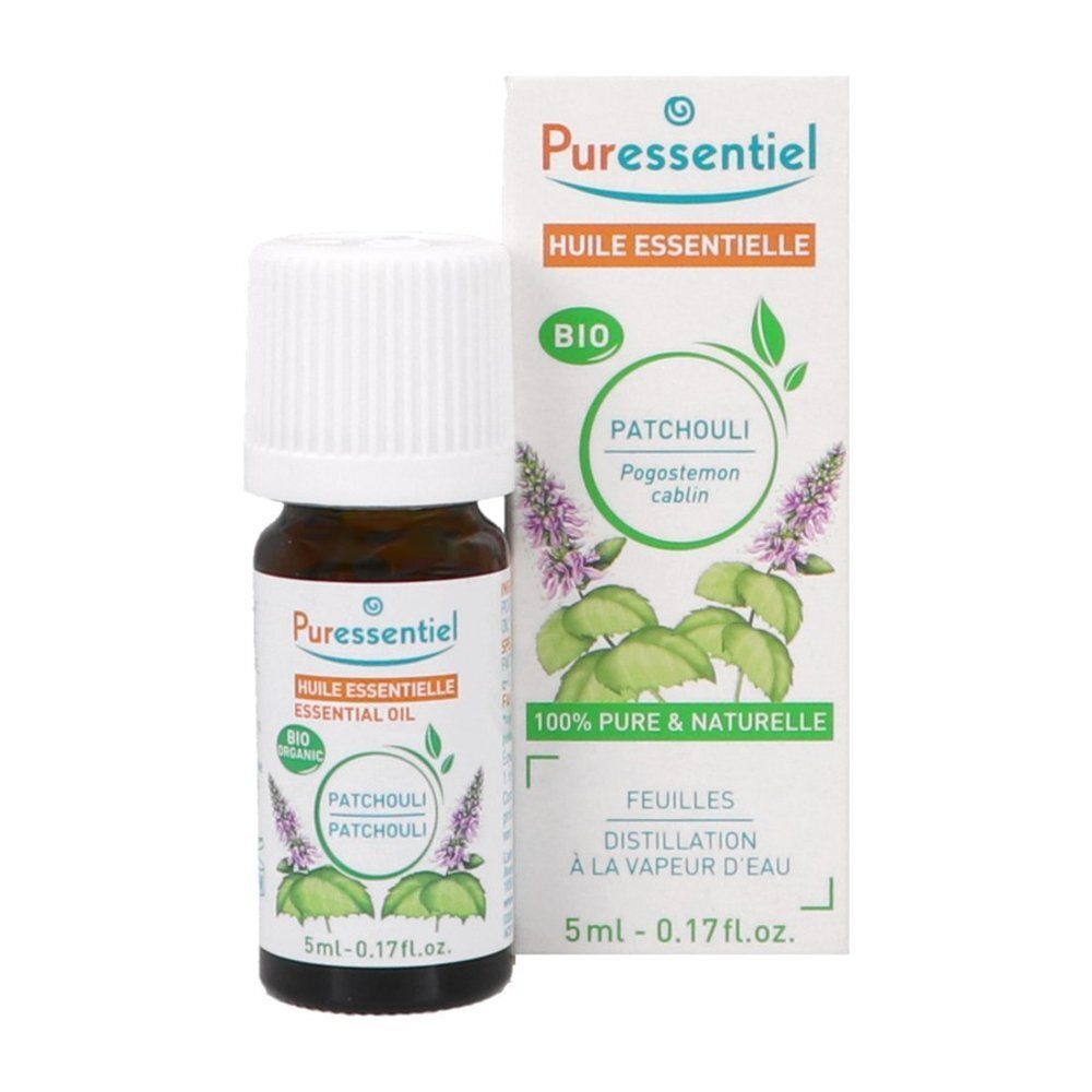 Flacon d'huile essentielle Puressentiel Patchouli avec bouchon blanc.