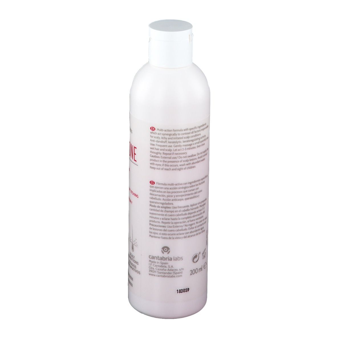 Rückseite einer weißen Flasche. Text in mehreren Sprachen. Produktname: Iraltone SD Shampoo. Mit weißem Deckel. 200 ml.