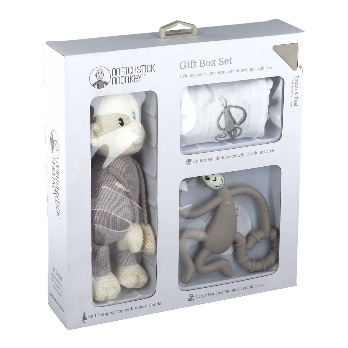 Geschenkbox-Set mit Stofftier, Decke und Beißring. Das Set enthält ein Stofftier mit Klettverschluss-Händen und einen Beißring.