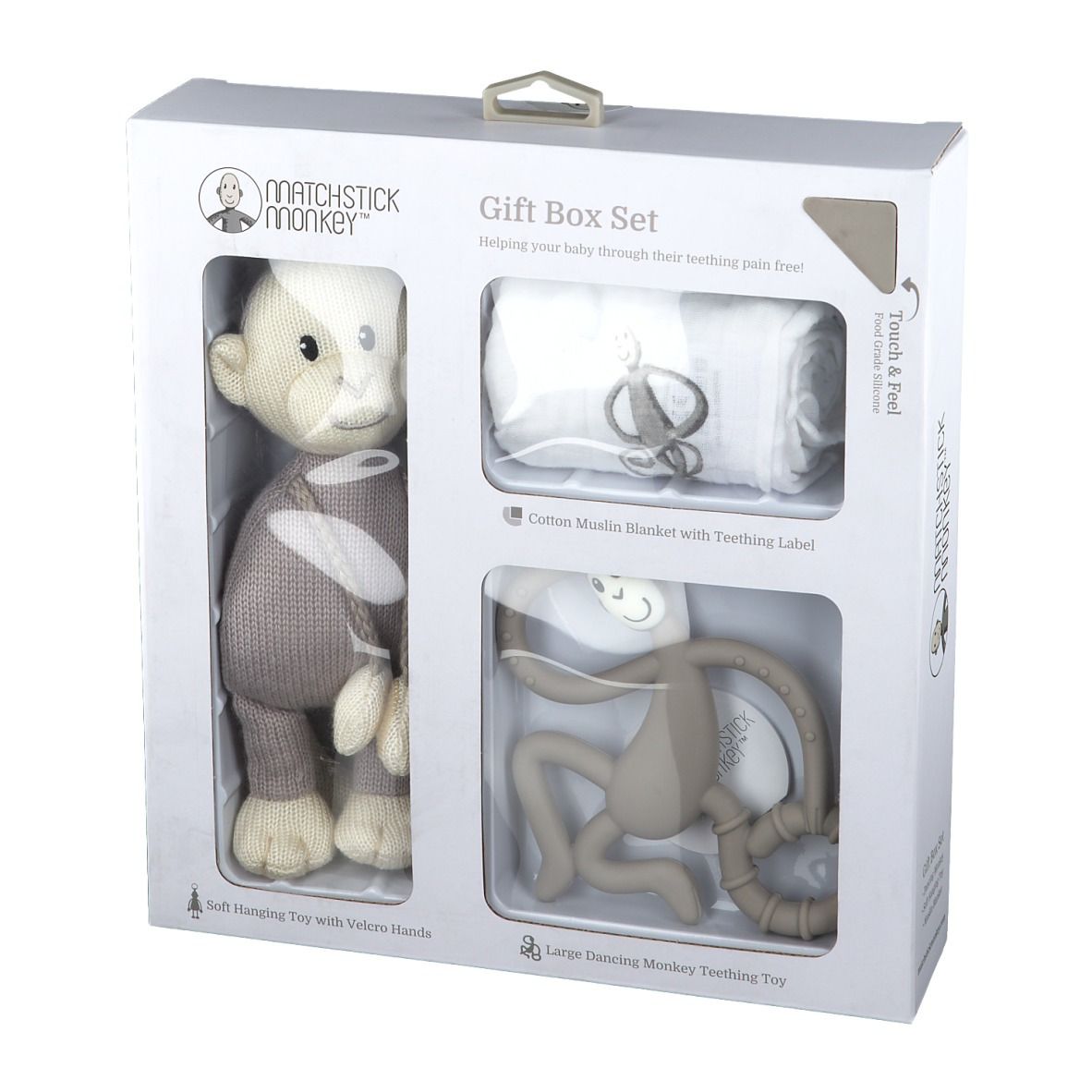 Geschenkbox-Set mit Stofftier, Decke und Beißring. Das Set enthält ein Stofftier mit Klettverschluss-Händen und einen Beißring.