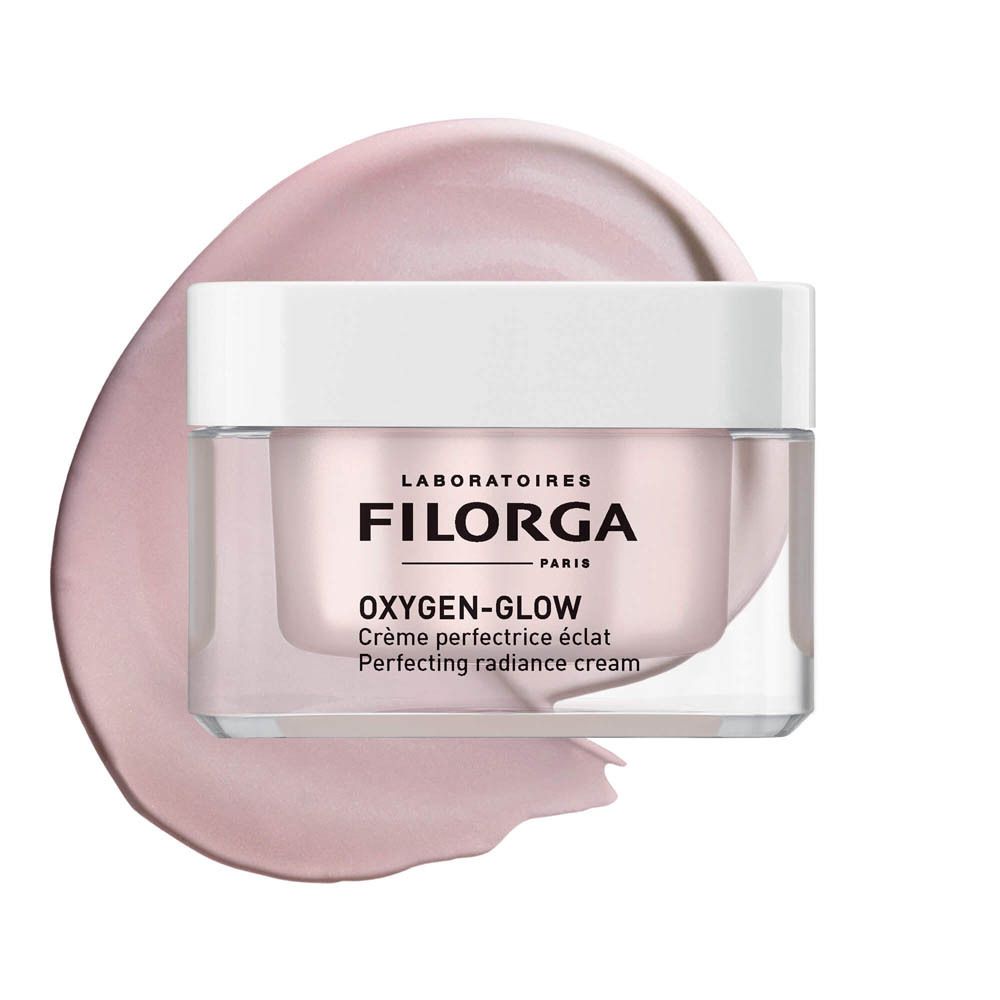 Pot de crème avec couvercle blanc. Inscription FILORGA OXYGEN-GLOW. Forme carrée.