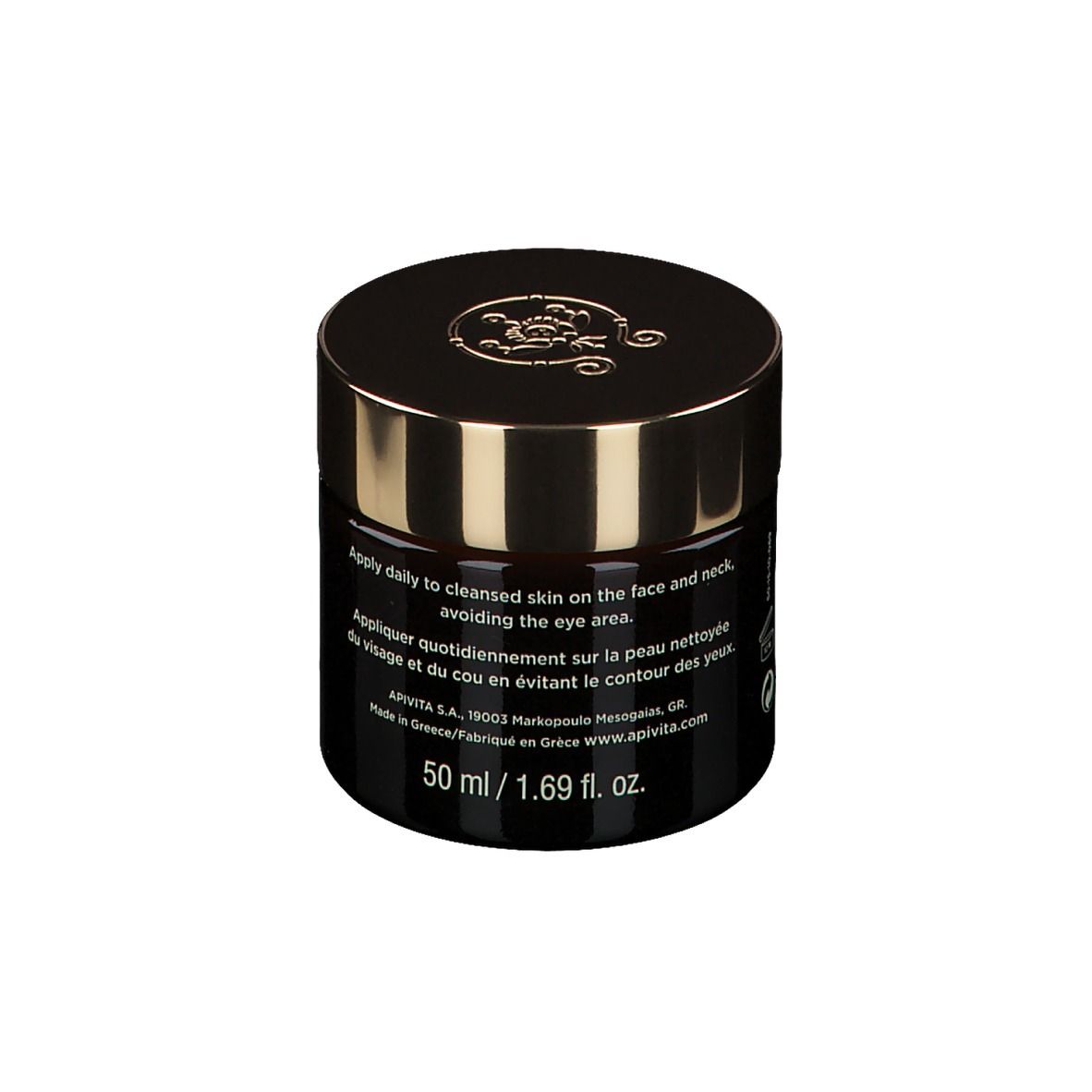 Pot de crème brun foncé avec couvercle doré. Inscription : Apivita Queen Bee, Holistic Age Defense Cream.