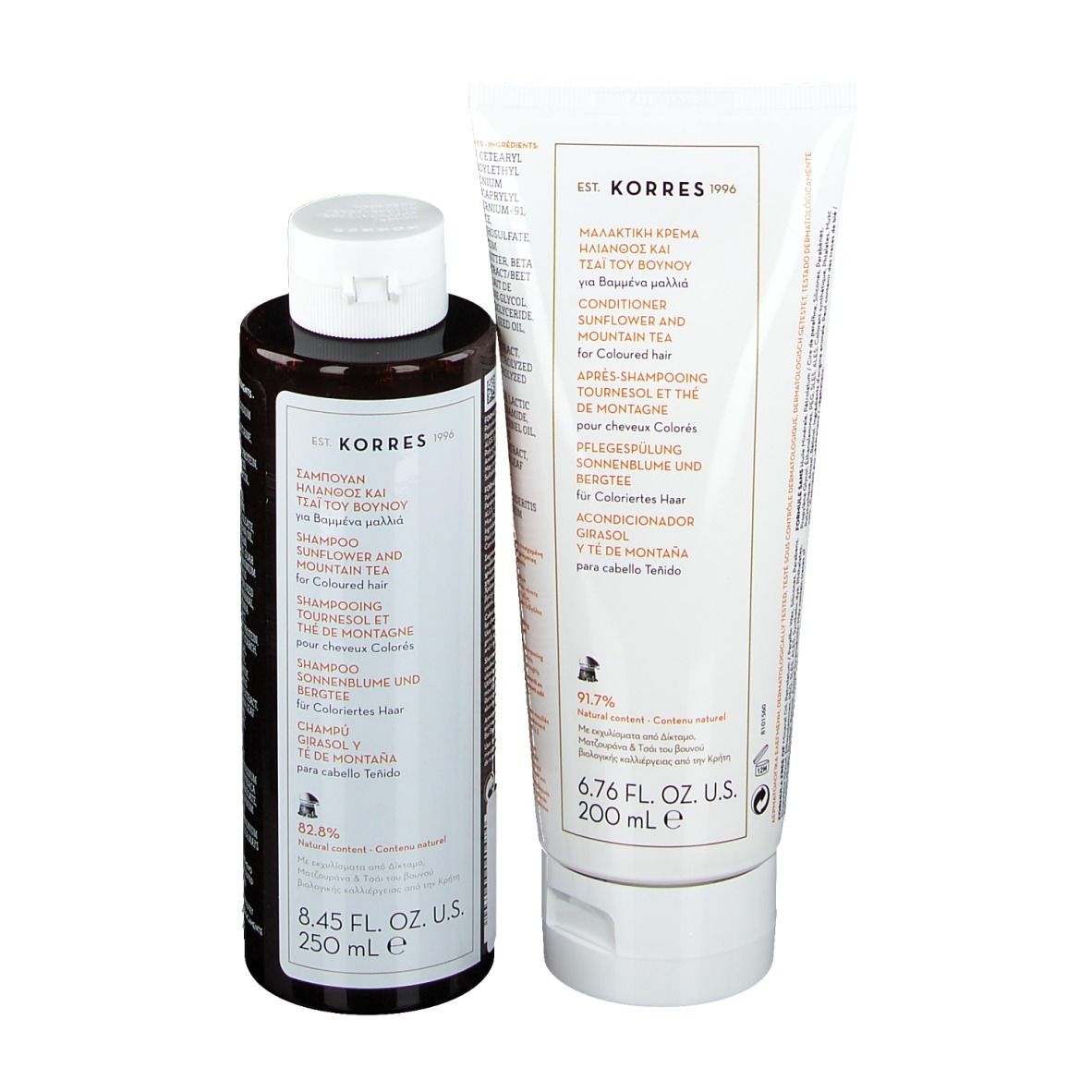 KORRES Shampoo und Conditioner. Flaschen und Tube. Sonnenblume & Bergtee. Text in mehreren Sprachen.