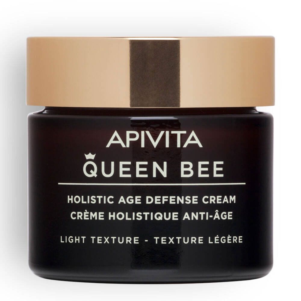 Dunkles Glas mit goldfarbenem Deckel. Aufschrift: APIVITA Queen Bee, Holistic Age Defense Cream, Light Texture.