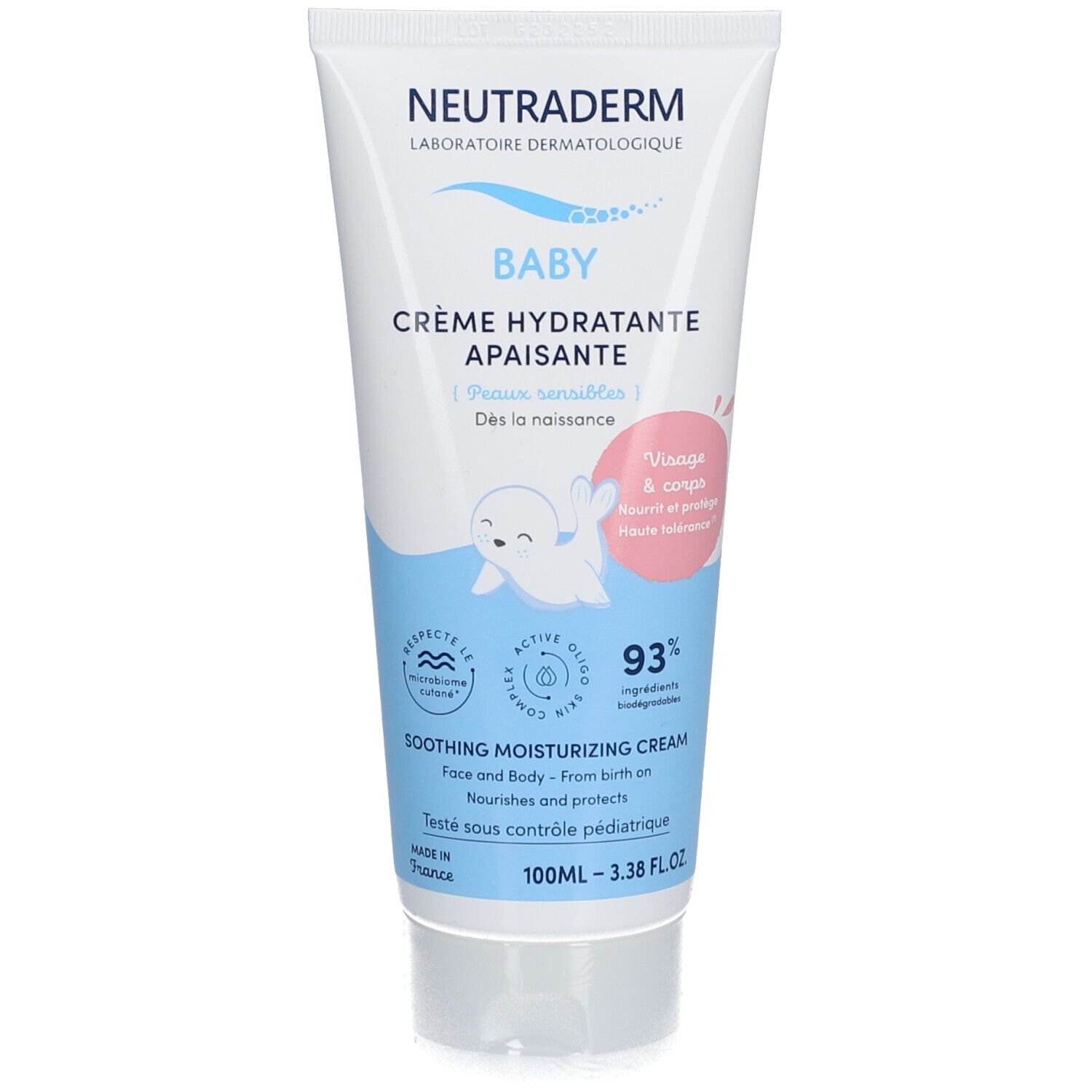 Creme-Tube für Babys, weiß mit blauen und rosa Akzenten. Enthält Text und eine Illustration eines Seehunds.