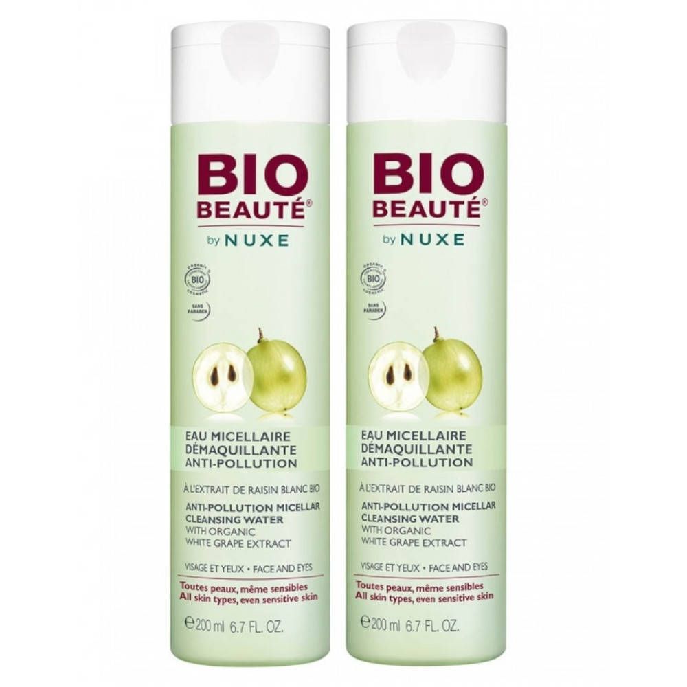 Deux flacons de BIO BEAUTÉ Eau Micellaire. Liquide verdâtre, bouchon blanc. Inscription: Anti-Pollution, NUXE.