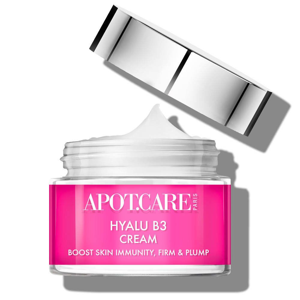 Pot de crème ouvert. Inscription: APOT.CARE PARIS, HYALU B3 CREAM. Étiquette rose. Couvercle argenté.