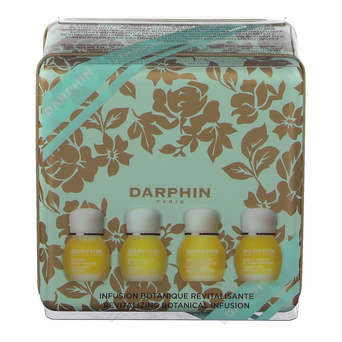 Geschenkbox mit vier kleinen Flaschen. Die Box ist mintgrün mit goldenen Blumenmustern. Auf der Box steht "DARPHIN" und Text.