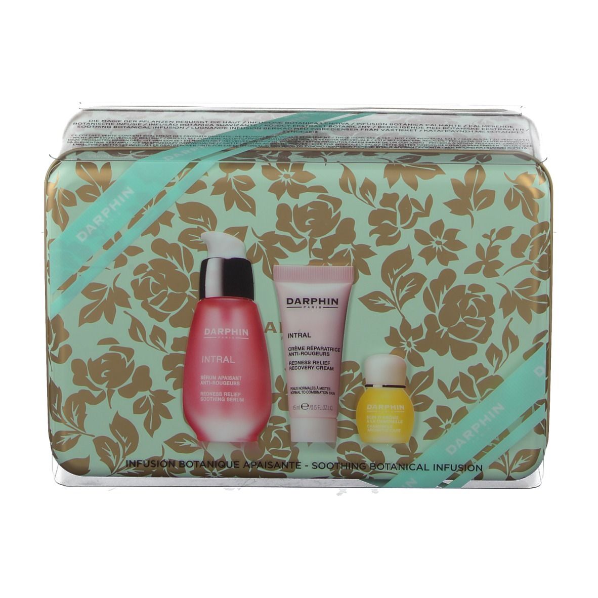 Geschenkbox mit floralem Muster, enthält Serum, Creme und Öl. Marke: DARPHIN.