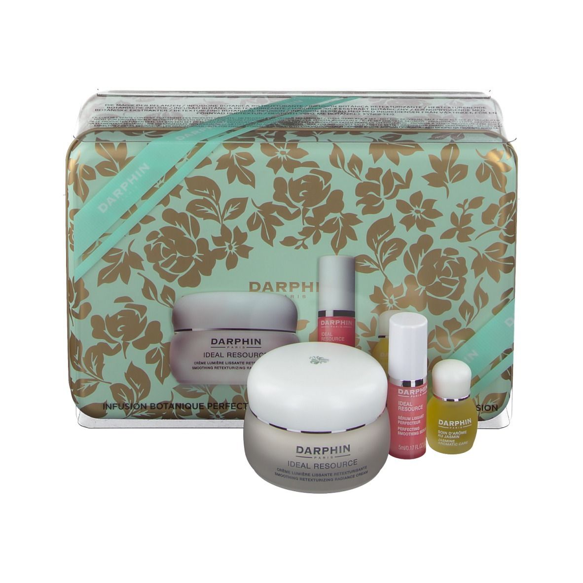 Geschenkbox mit floralem Muster, enthält Creme, Serum und Öl. Marke: DARPHIN.