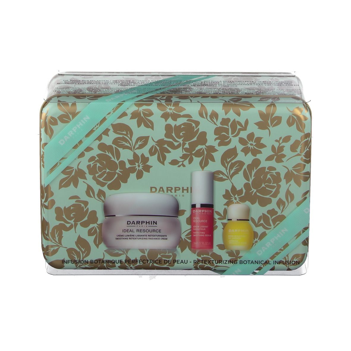 Geschenkbox mit floralem Muster, enthält Creme, Serum und Öl. Marke: DARPHIN.