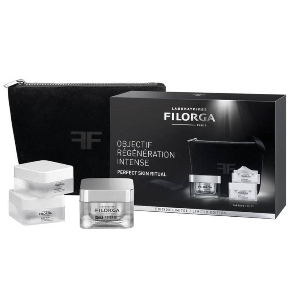 Coffret cadeau cosmétique. Trousse noire, crèmes en pots carrés. Logo Filorga visible. Edition limitée.