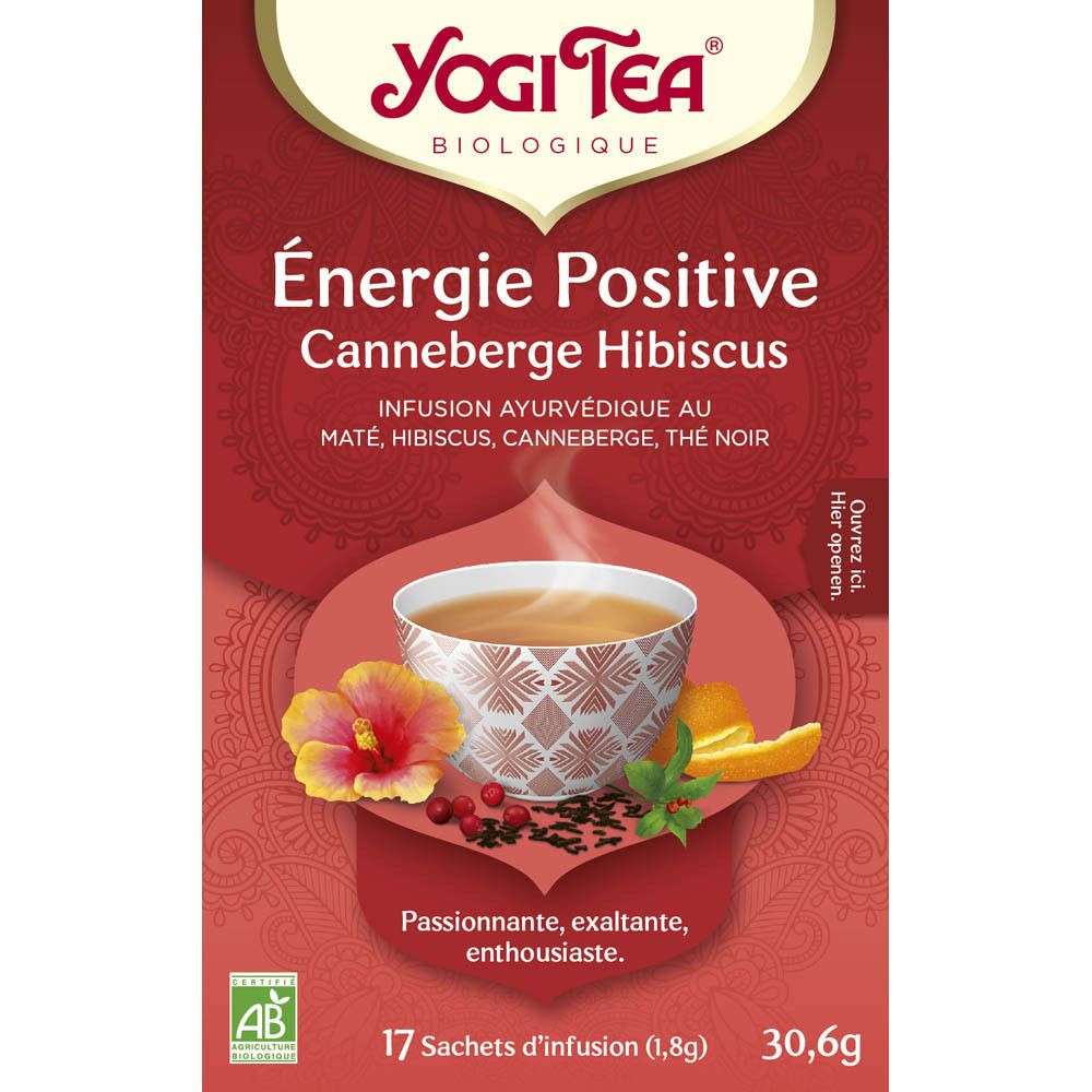 Boîte de thé Yogi Tea® Énergie Positive. Inscription: Énergie Positive, Canneberge Hibiscus. 17 sachets. Logo AB.