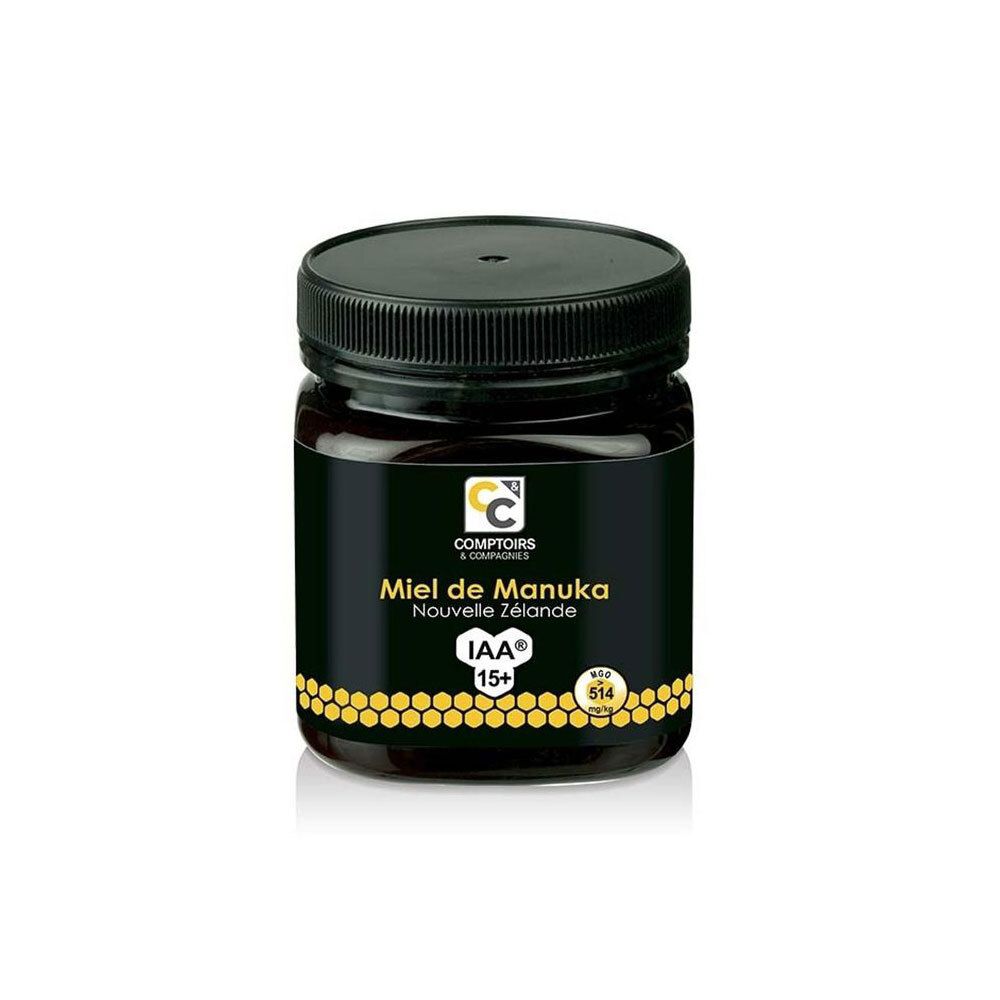 Pot de miel noir. Étiquette: Miel de Manuka Nouvelle Zélande IAA 15+. Marque Comptoirs & Compagnies.
