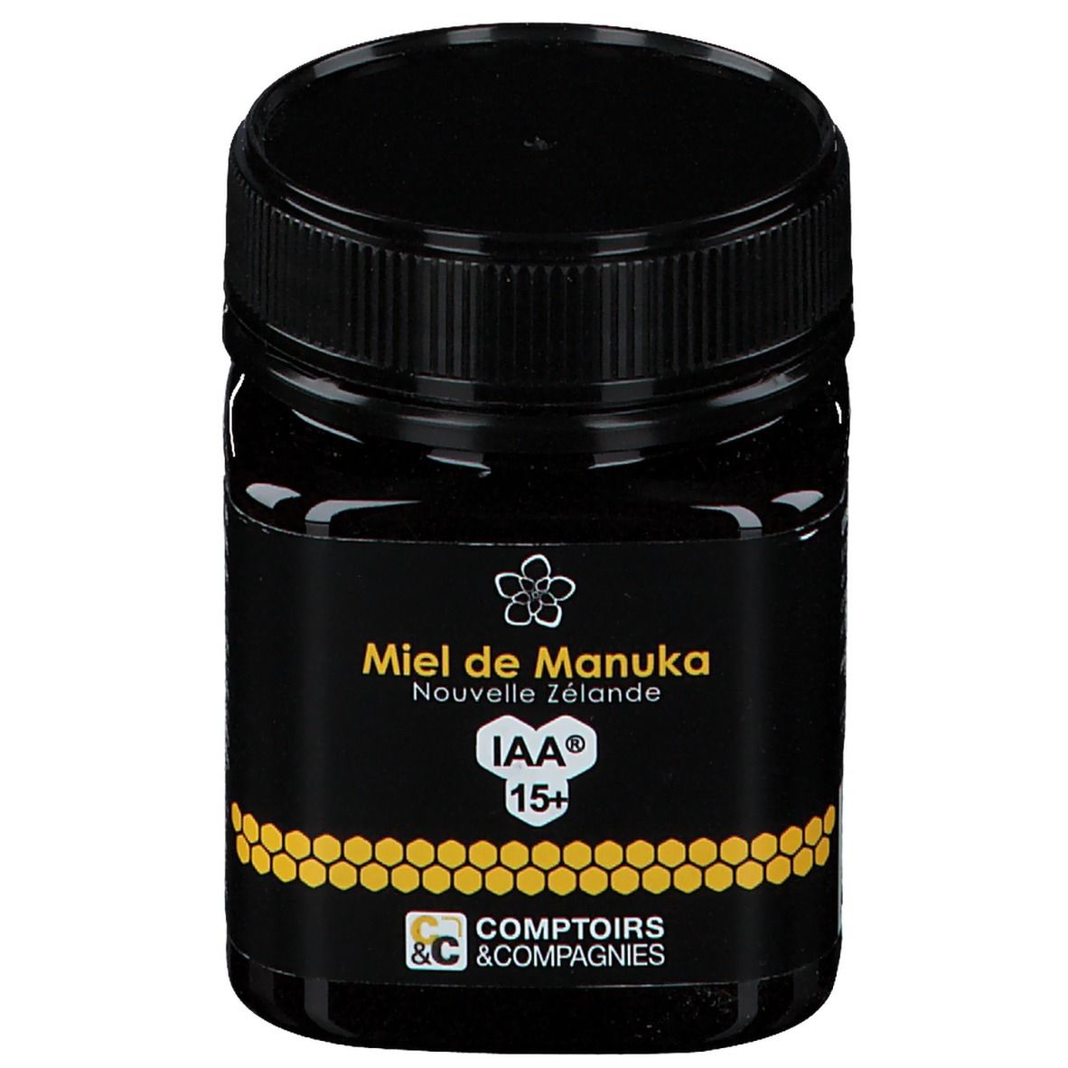 Schwarzes Honigglas. Aufschrift: Miel de Manuka Nouvelle Zélande IAA 15+. Logo Comptoirs & Compagnies. Schwarzer Deckel.