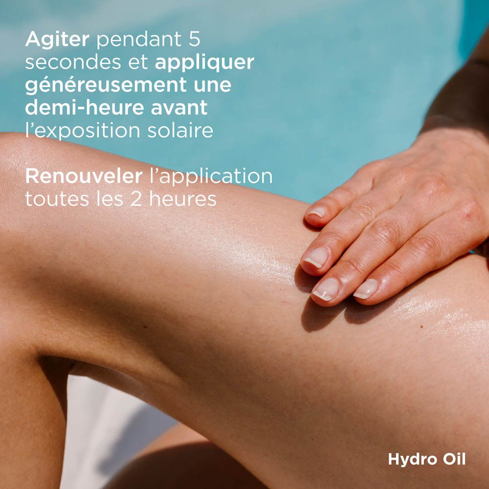 FOTOPROTECTOR ISDIN HydroOil SPF 30. Texte: Agiter 5 secondes, appliquer 30 minutes avant l'exposition solaire.