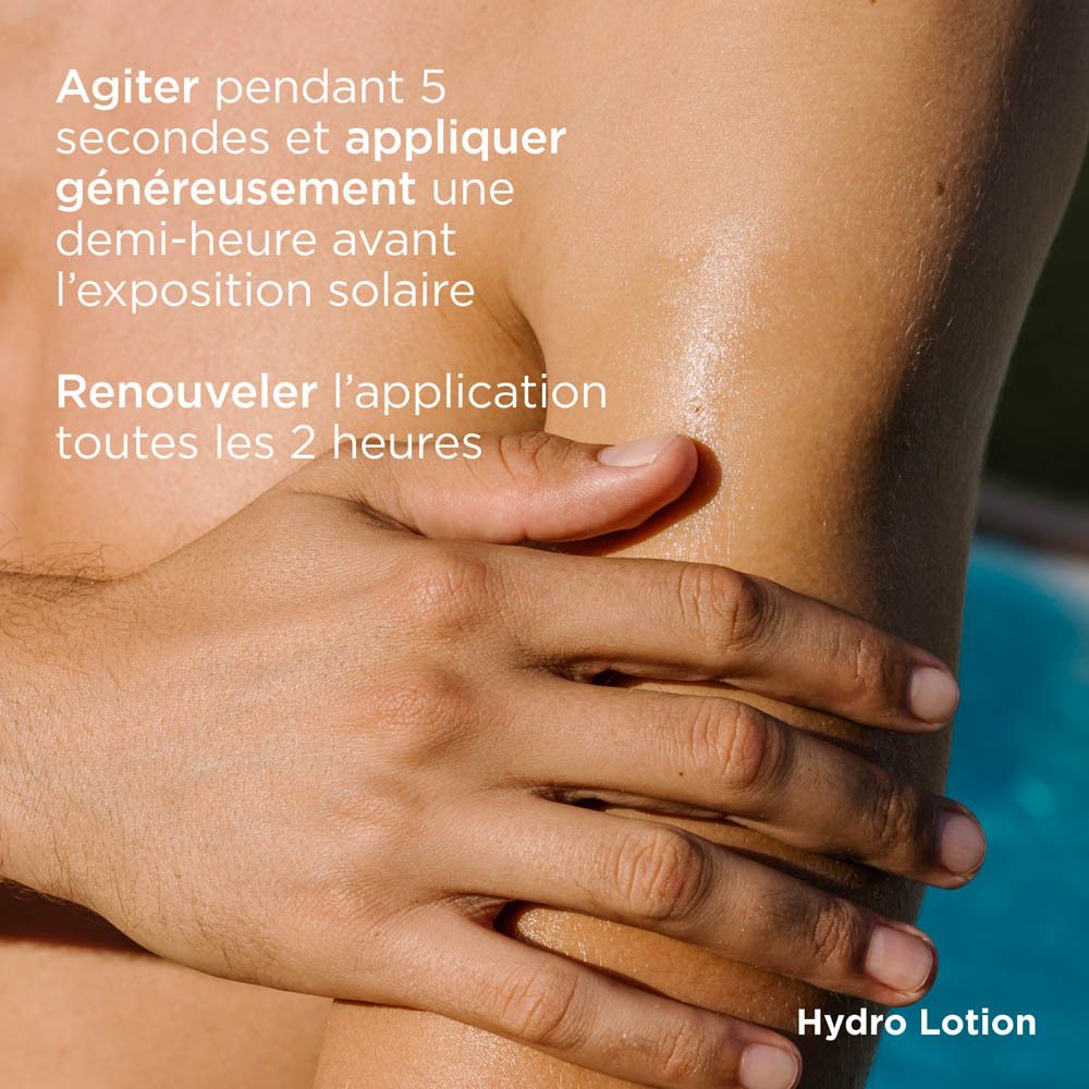 Flacon. Bouchon jaune, base bleue. Texte: ISDIN Fotoprotector Hydro Lotion 50. Inscription: Protect & Detox.