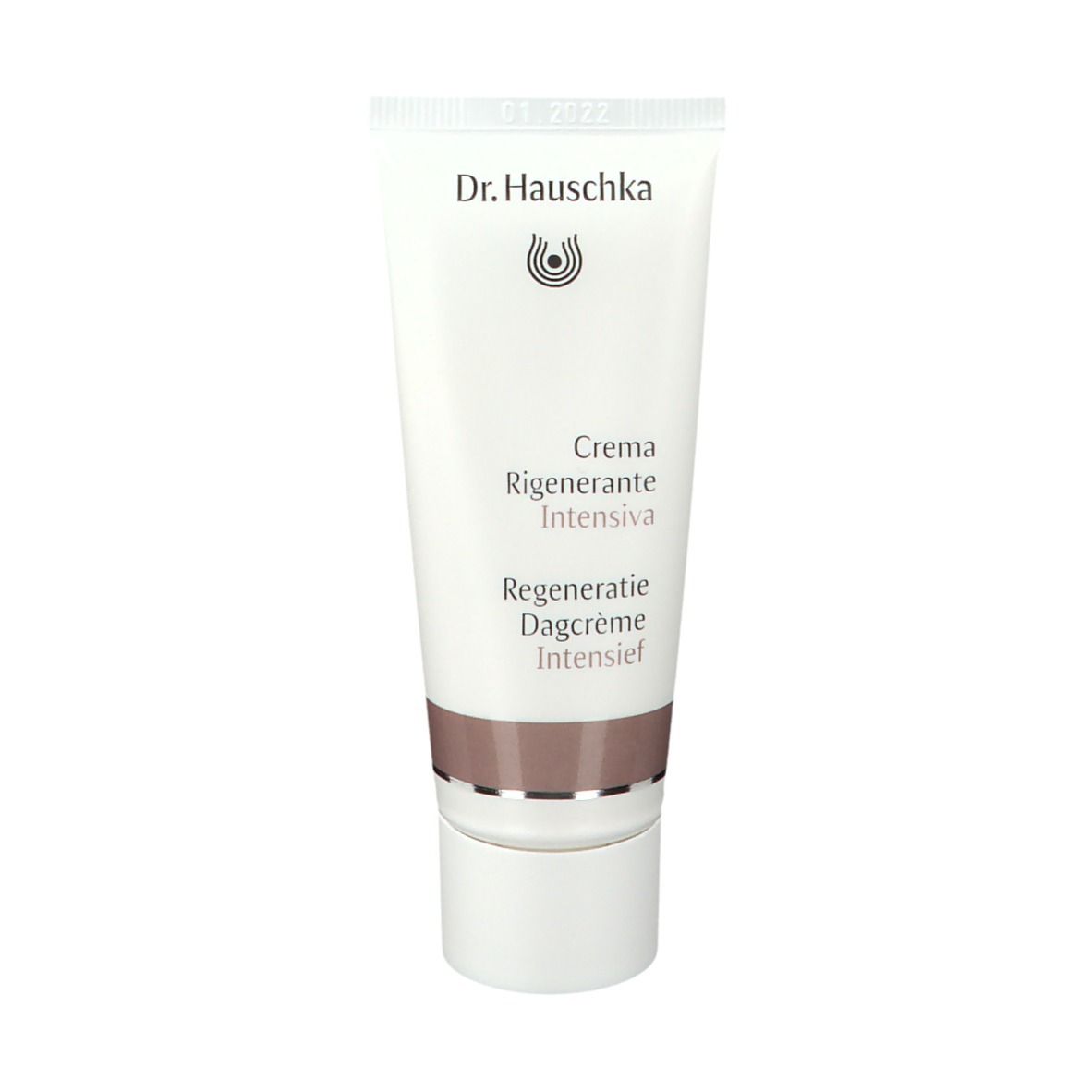 Weiße Tube mit braunem Streifen. Aufschrift: Dr. Hauschka, Creme Regenerante Intensiva, Regeneration Dagcrème Intensief.