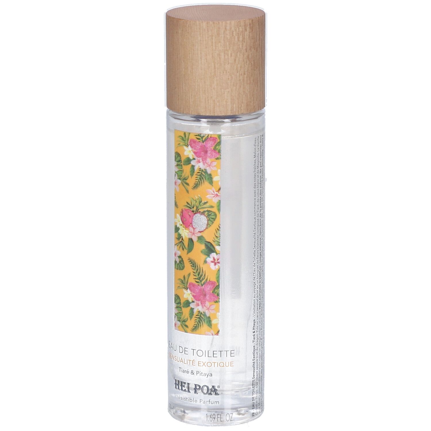 Zylindrische Flasche mit Holzverschluss. Gelbes Etikett mit Blumenmuster. Text: Eau de Toilette, Sensualité exotique, Tiaré & Pitaya, Hei Poa.