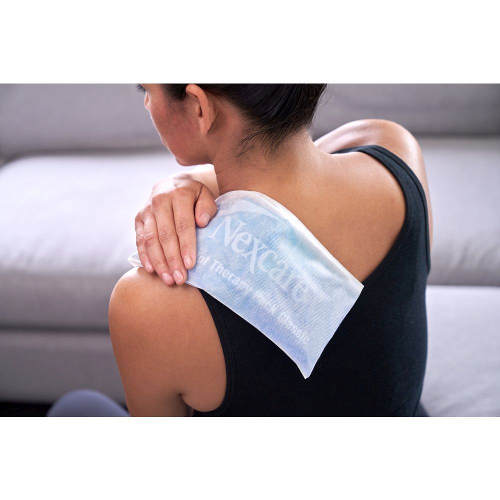 3M Nexcare ColdHot Therapy Pack Classic. Emballage avec produit et personne.