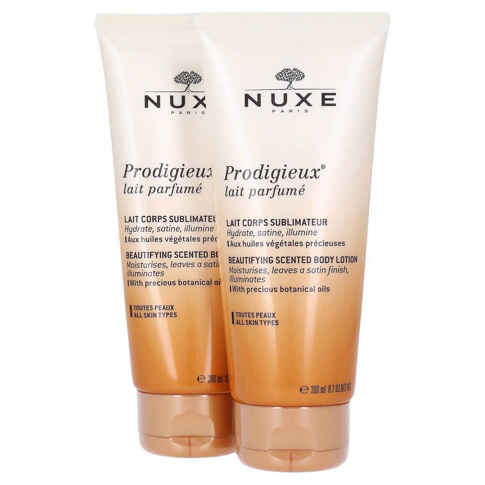 Zwei Tuben NUXE Prodigieux® Körpermilch. Weiß-goldene Tuben mit braunen Verschlüssen. Produktname und Text deutlich sichtbar.