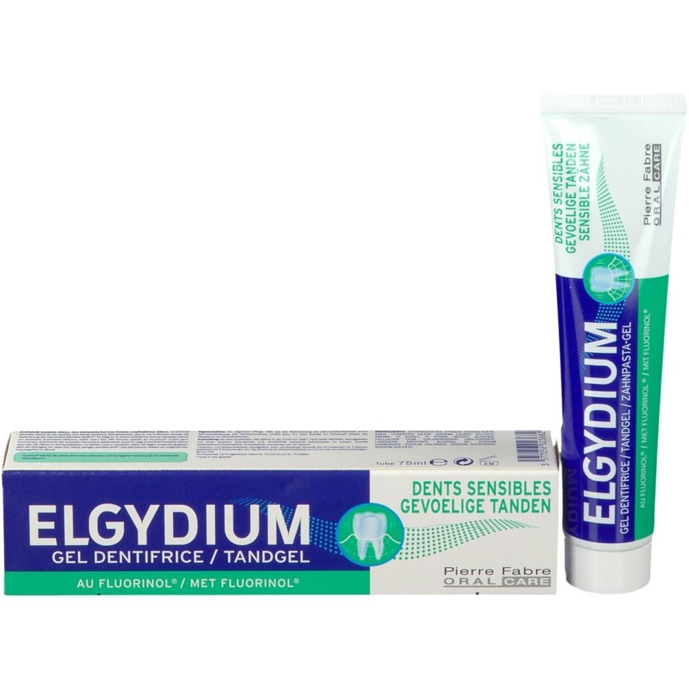 Tube et boîte de dentifrice ELGYDIUM Sensitiv. Tube : blanc, bleu, vert. Boîte : bleu, blanc, vert. Texte.