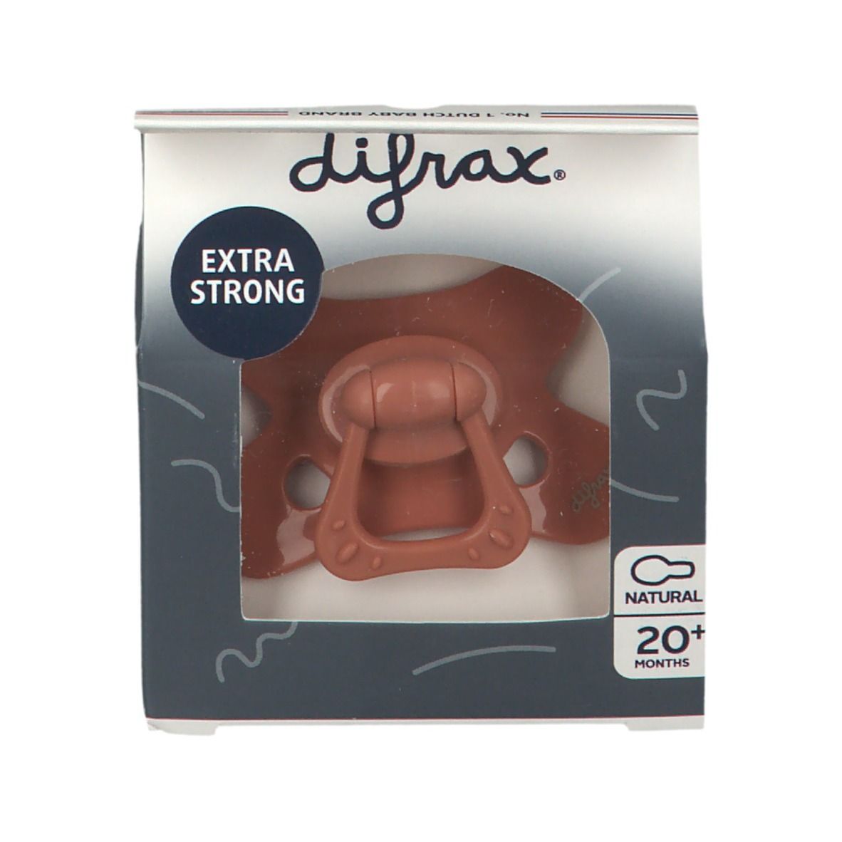 Sucette dans son emballage. Visible: sucette marron, emballage avec "EXTRA STRONG" et "NATURAL 20+ months".