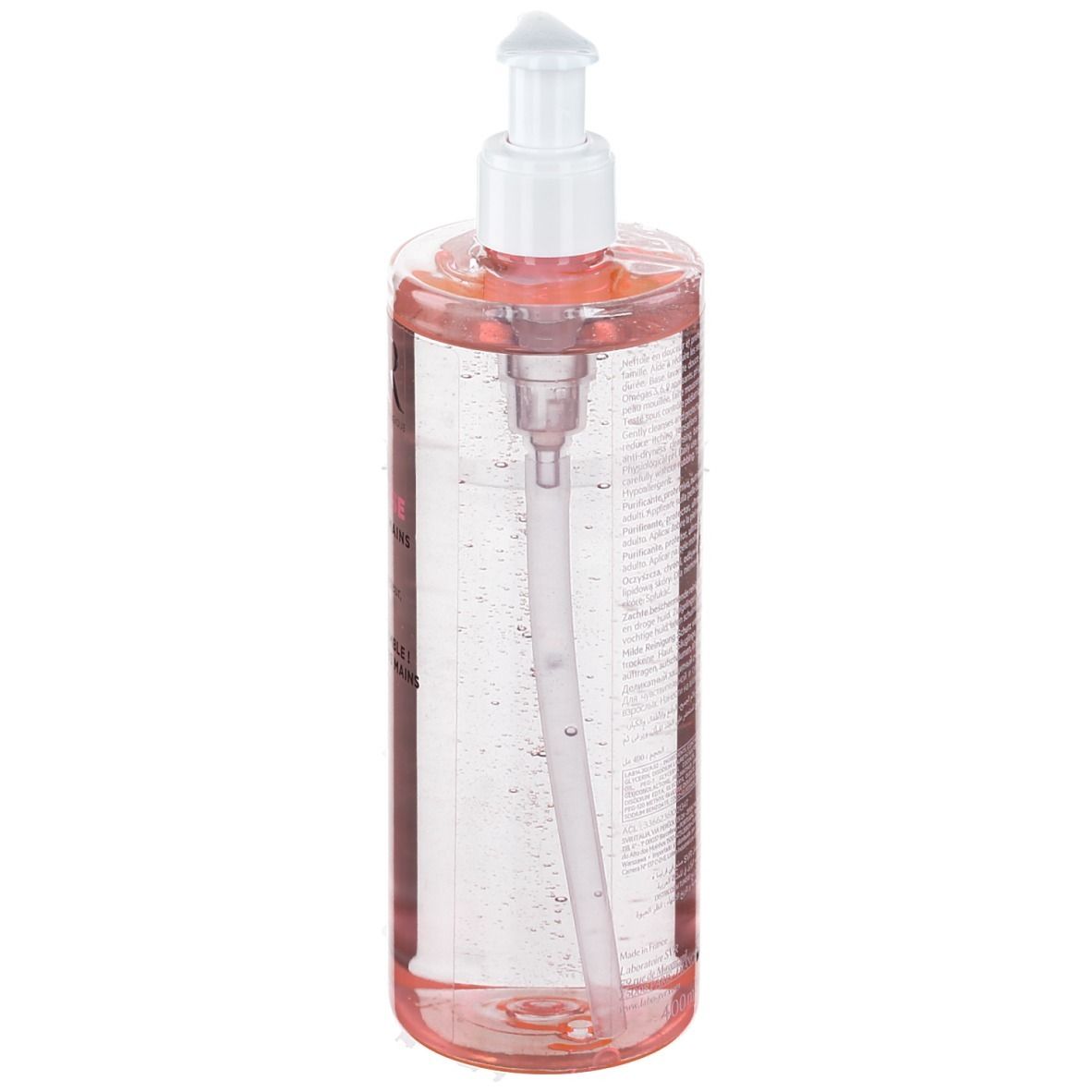 Transparente Flasche mit rosa Flüssigkeit und weißem Pumpverschluss. Der Pumpmechanismus ist sichtbar.