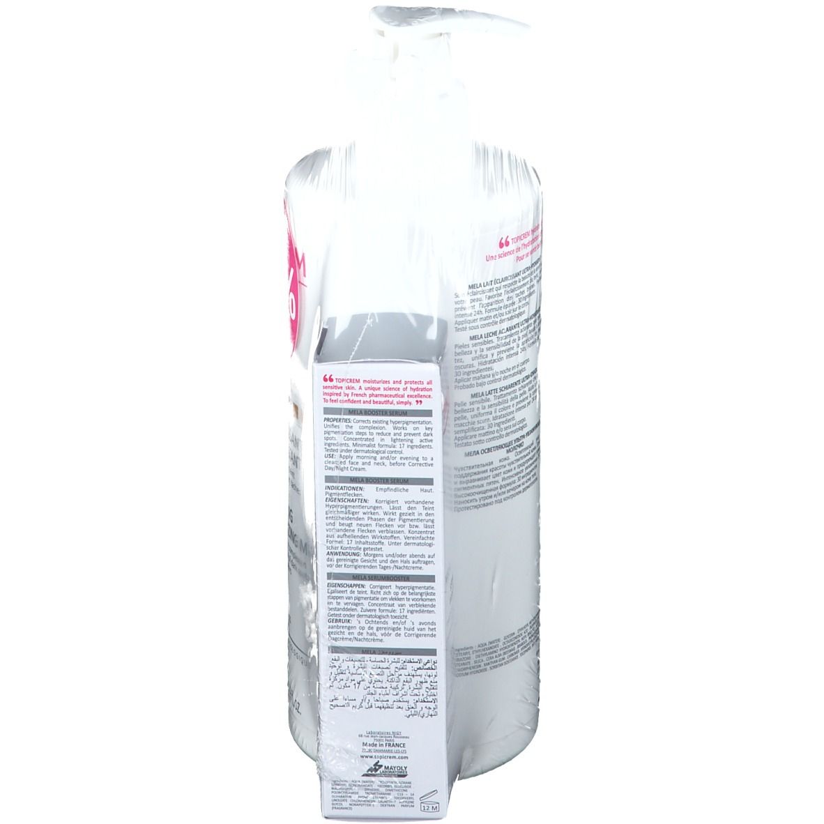 Vue arrière de la lotion et du sérum TOPICREM MELA. Texte au dos de la bouteille et du sérum. Emballé dans du film plastique.