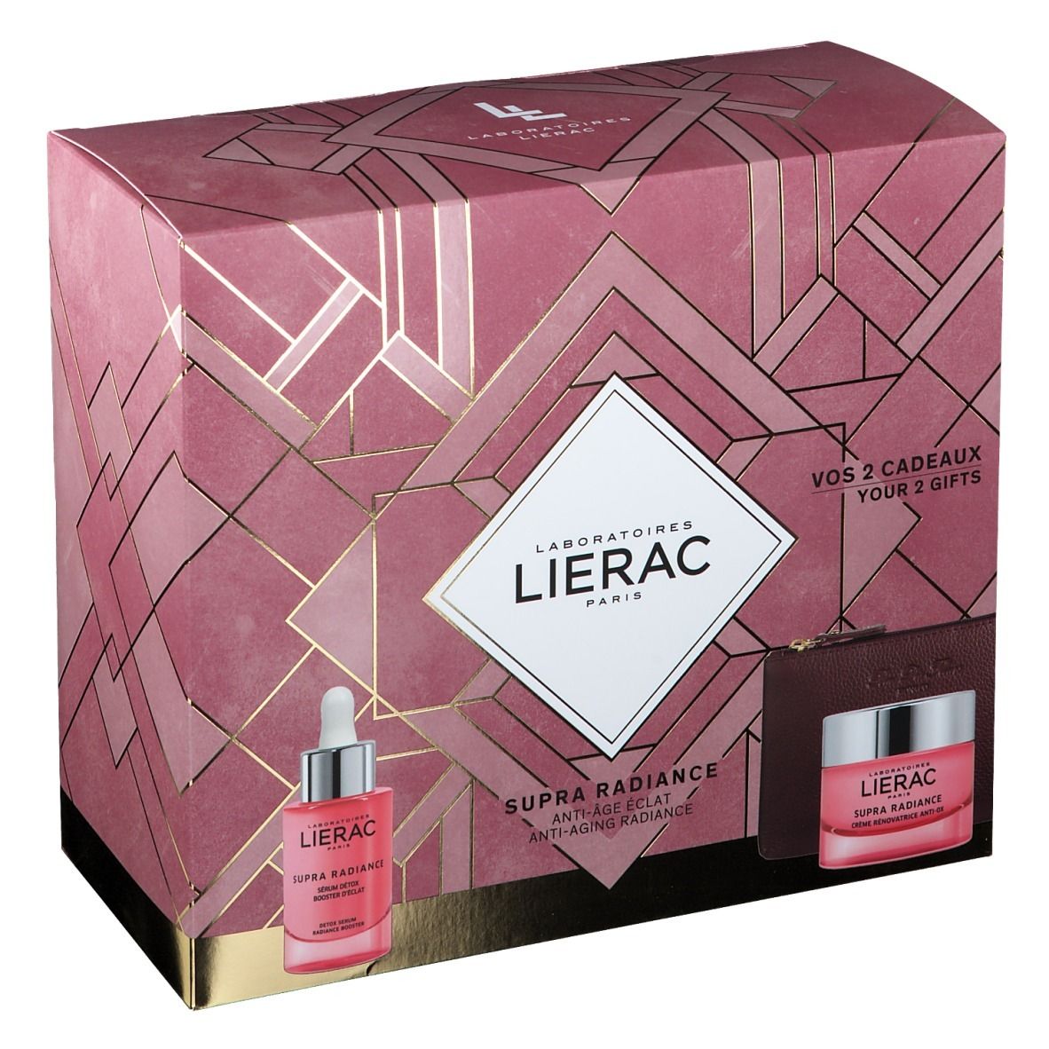 Geschenkset mit Serum, Creme und Kosmetiktasche. Rosa Verpackung mit Logo und Produktnamen. Sichtbare Schriftzüge.