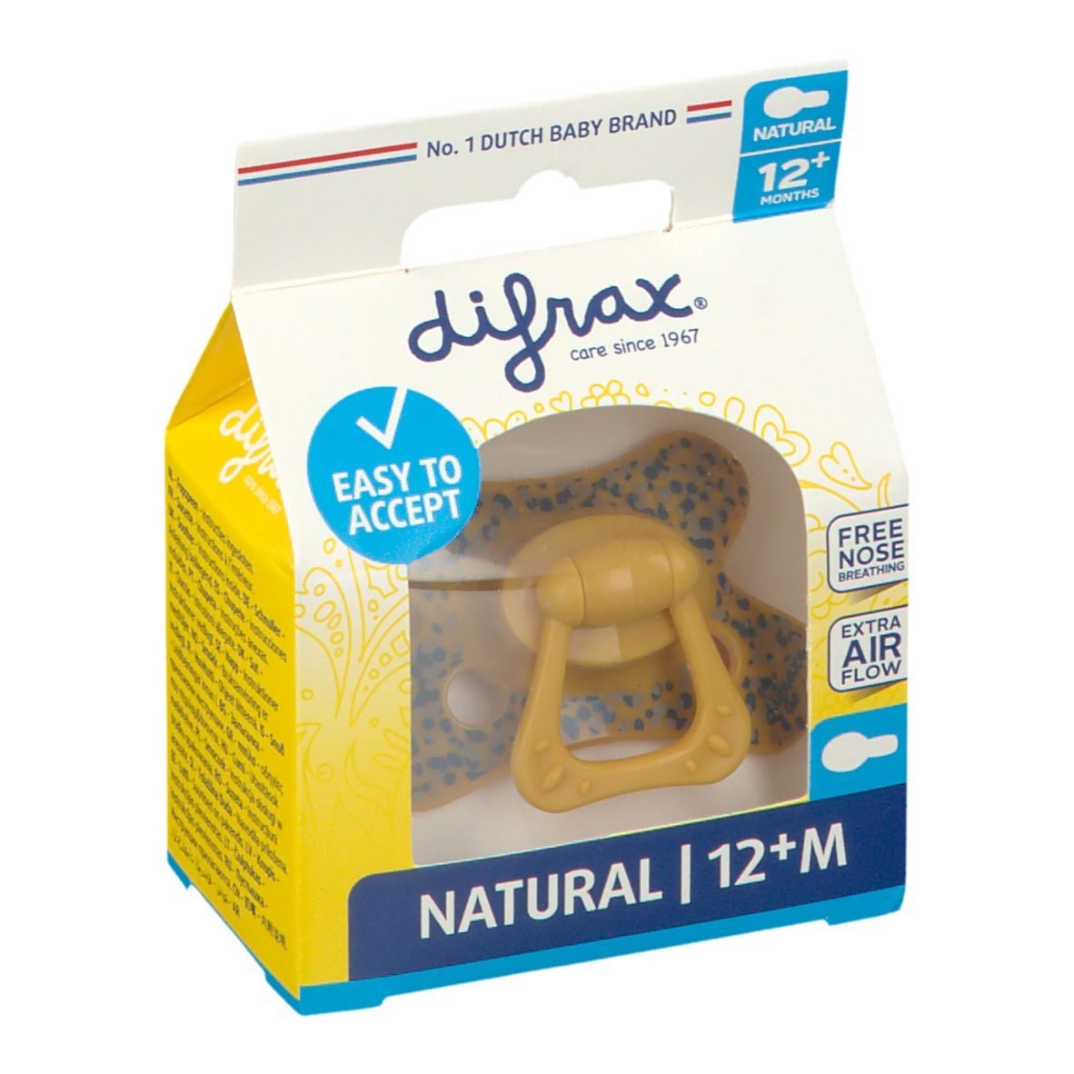 Emballage de sucette. Sucette jaune avec poignée, motif bleu. Texte: NATURAL 12+M, EASY TO ACCEPT, FREE NOSE BREATHING, EXTRA AIR FLOW.