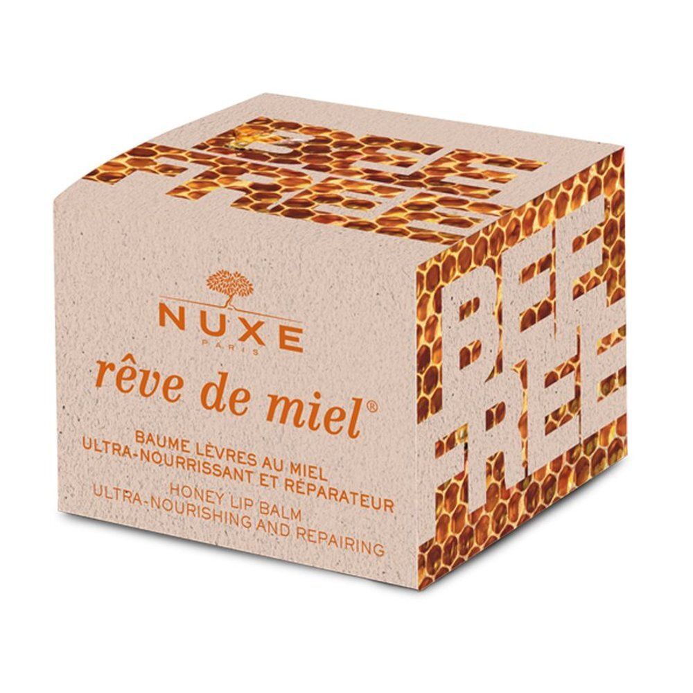 Emballage du baume à lèvres Nuxe Rêve de Miel avec motif alvéolé et inscription "Bee Free".