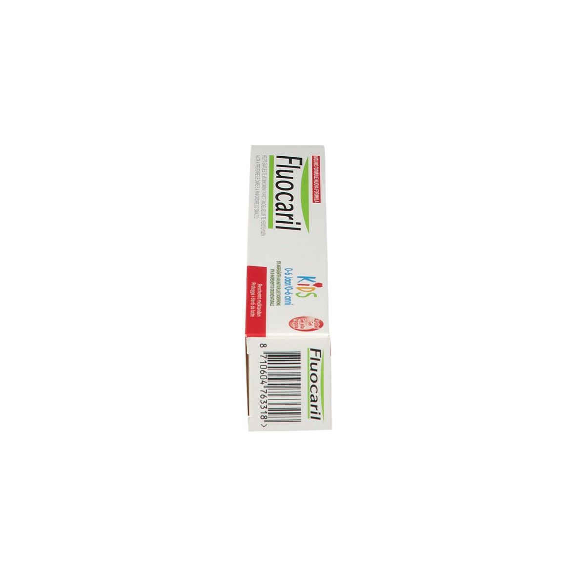 Zahnpasta-Schachtel für Kinder. Weiß, mit roter und grüner Schrift. Aufschrift: Fluocaril Kids 0-6 ans.