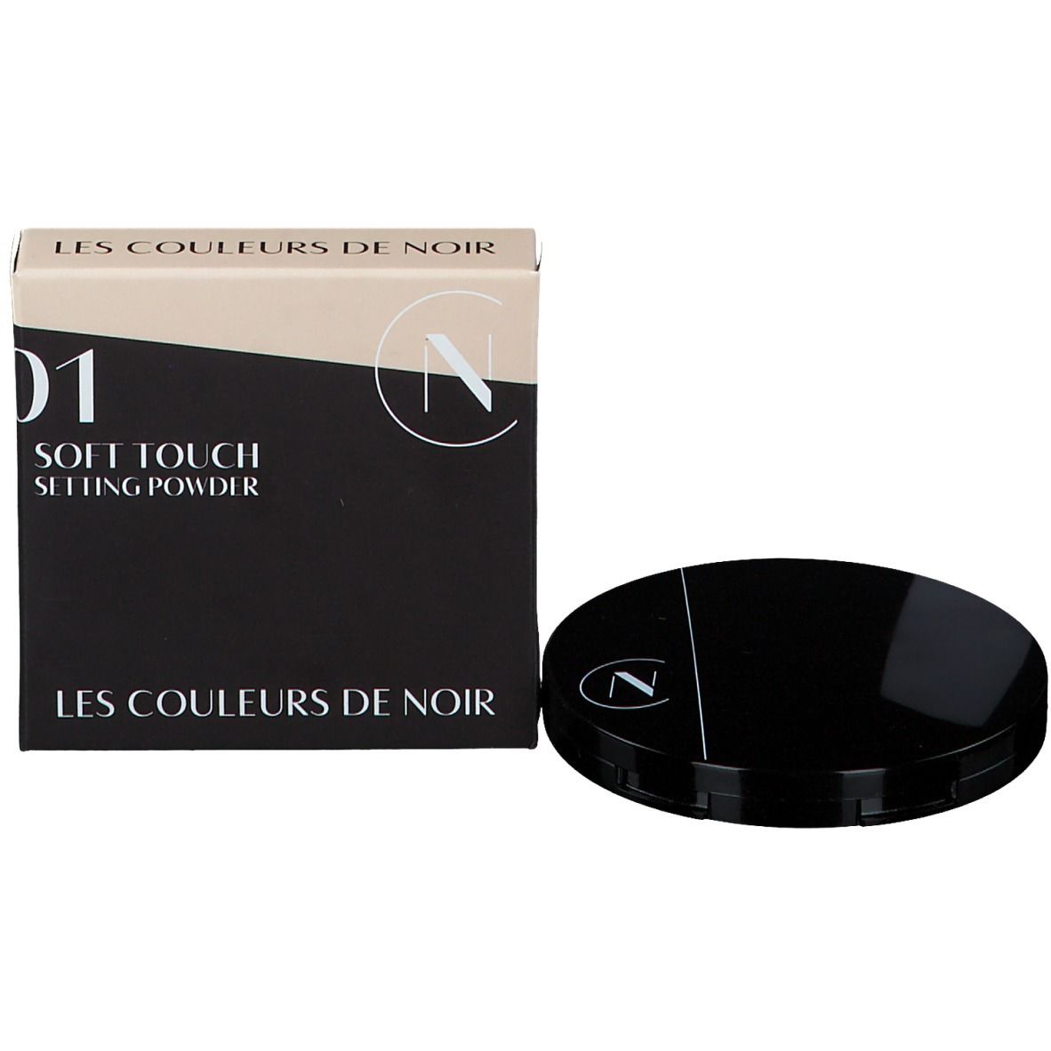 Boîte noire et boîtier rond. Sur la boîte : Les Couleurs de Noir, Soft Touch Setting Powder.