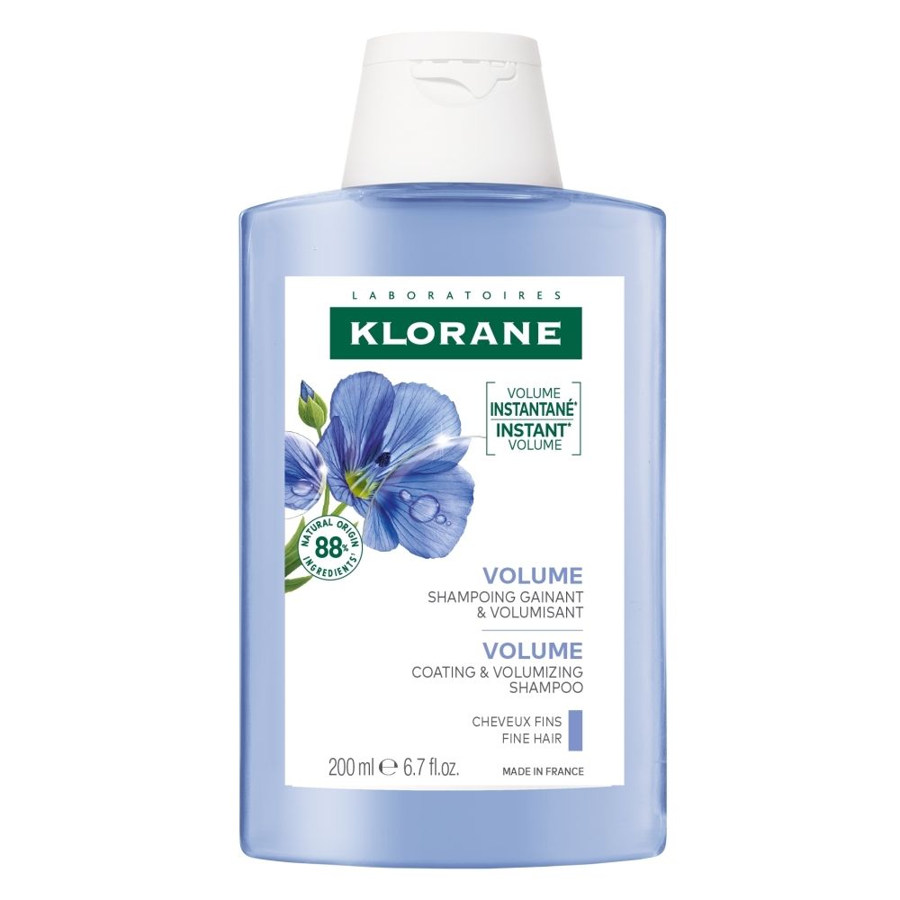 Bouteille de Shampooing Klorane BIO Lin Volume avec illustration de fleurs de lin et 88% d'ingrédients naturels.