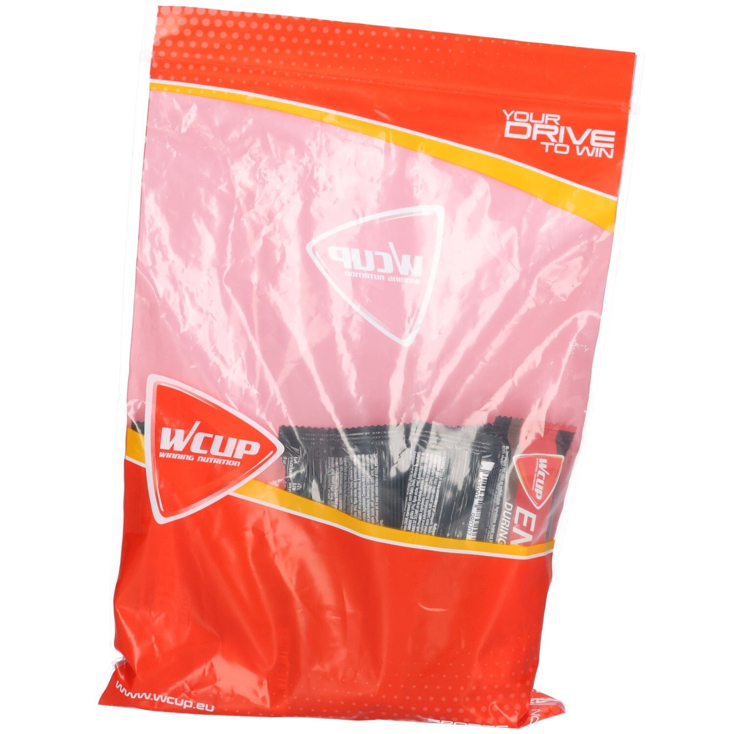 Transparente Verpackung mit Energie-Riegeln. Rote Umverpackung mit weißem Wcup-Logo und Text. Sichtbare Riegel in schwarzer Folie.